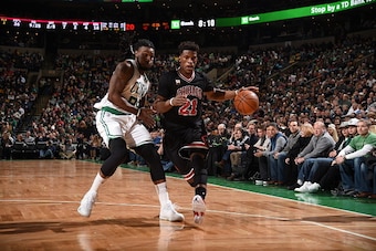 BOSTON, MA - JANUARY 22:  Jimmy Butler #21 of the Chicago Bulls drives to the basket against Jae Crowder #99 of the Boston Celtics on January 22, 2016 at the TD Garden in Boston, Massachusetts.  NOTE TO USER: User expressly acknowledges and agrees that, b