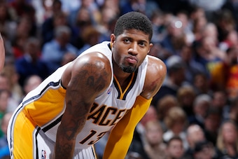 INDIANAPOLIS, IN - JANUARY 30: Paul George #13 of the Indiana Pacers looks on against the Denver Nuggets in the second half of the game at Bankers Life Fieldhouse on January 30, 2016 in Indianapolis, Indiana. The Pacers defeated the Nuggets 109-105 in ove