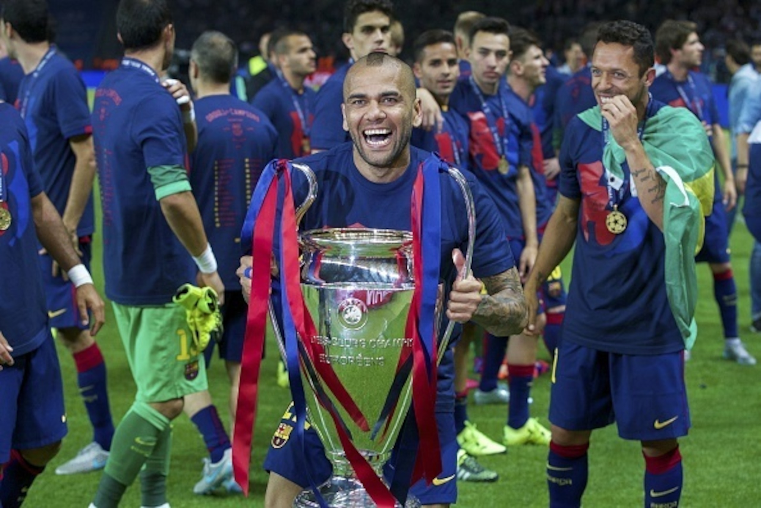 (L-R) Dani Alves of FC Barcelona with Champions League trophy, Adriano of FC Barcelona during the UEFA Champions League final match between Barcelona and Juventus on June 6, 2015 at the Olympic stadium in Berlin, Germany.(Photo by VI Images via Getty Ima (L-R) Dani Alves of FC Barcelona with Champions League trophy, Adriano of FC Barcelona during the UEFA Champions League final match between Barcelona and Juventus on June 6, 2015 at the Olympic stadium in Berlin, Germany.(Photo by VI Images via Getty Ima