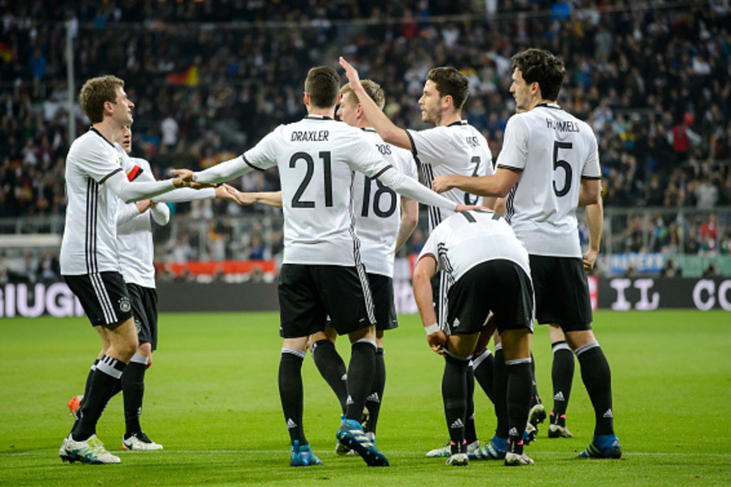 MUNICH, GERMANY - MARCH 29:  Toni Kroos of Germany celebrates with team mates after scoring his team's first goal during the International Friendly match between Germany and Italy at Allianz Arena on March 29, 2016 in Munich, Germany.  (Photo by Boris Str
