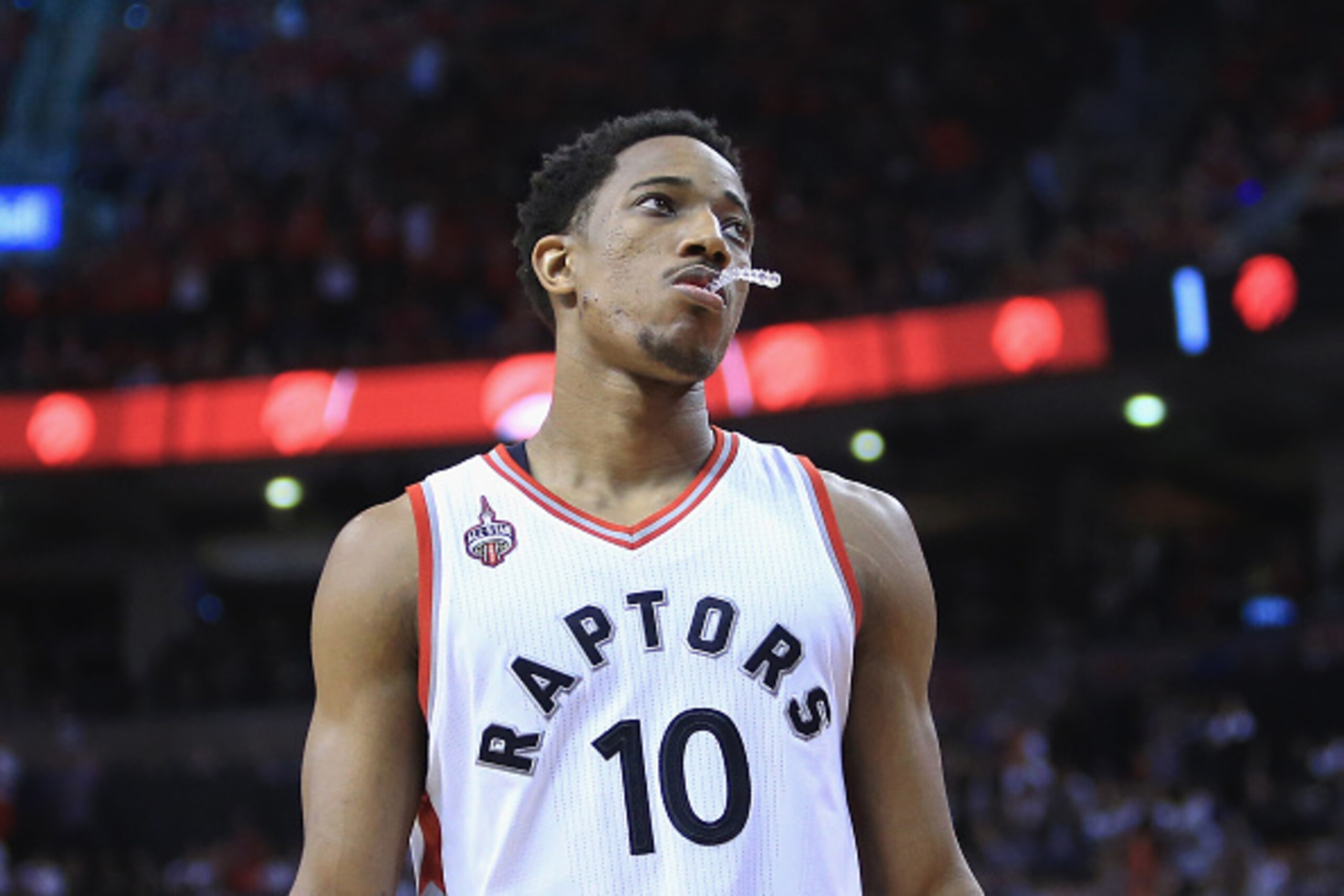 TORONTO, ON - MAY 21:  DeMar DeRozan #10 of the Toronto Raptors reacts during the second half against the Cleveland Cavaliers in game three of the Eastern Conference Finals during the 2016 NBA Playoffs at Air Canada Centre on May 21, 2016 in Toronto, Cana