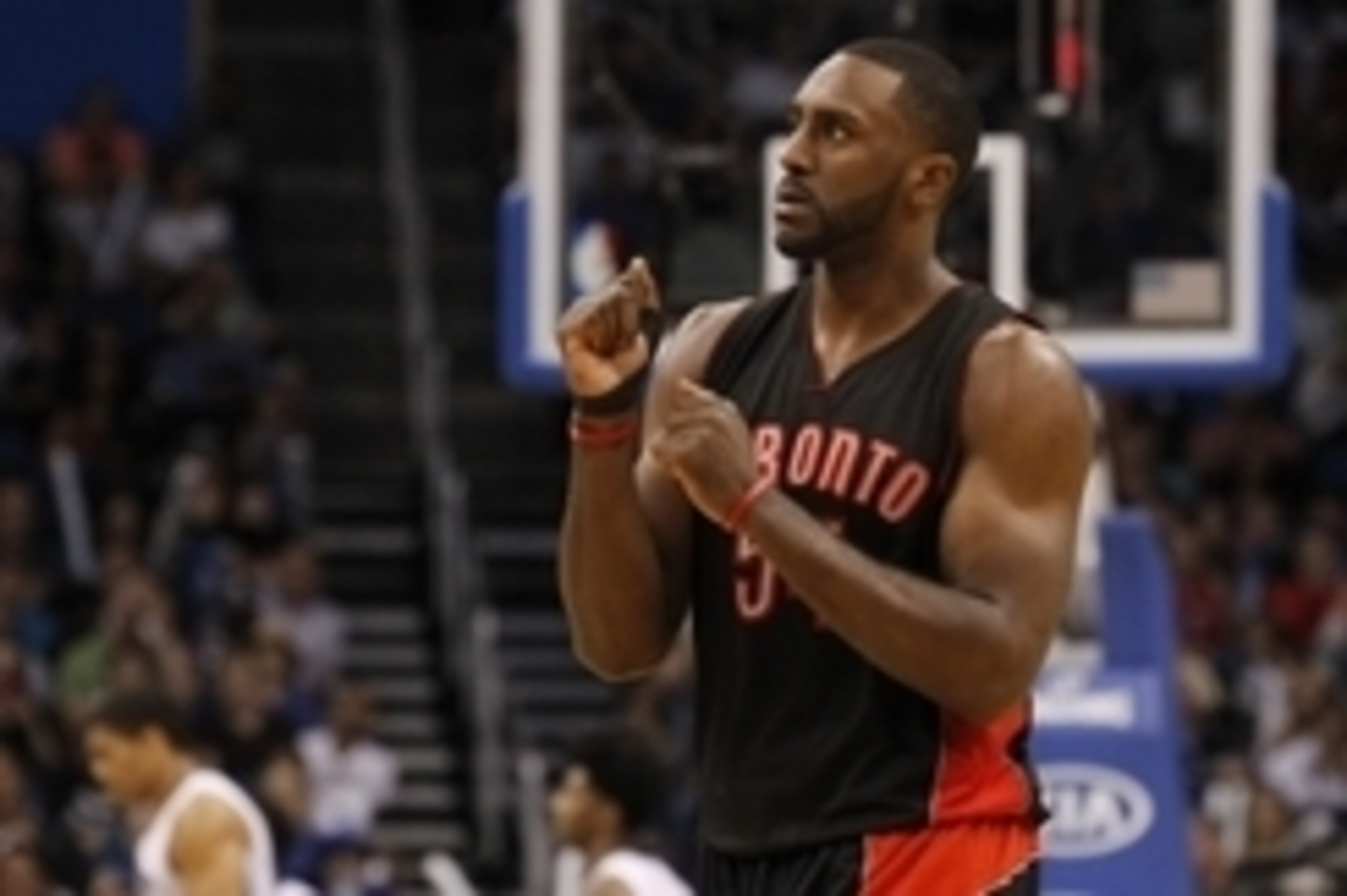 Apr 10, 2015; Orlando, FL, USA; Toronto Raptors forward Patrick Patterson (54) celebrates on the court during the fourth quarter against the Orlando Magic  at Amway Center. Toronto Raptors defeated the Orlando Magic 101-99. Mandatory Credit: Kim Klement-U