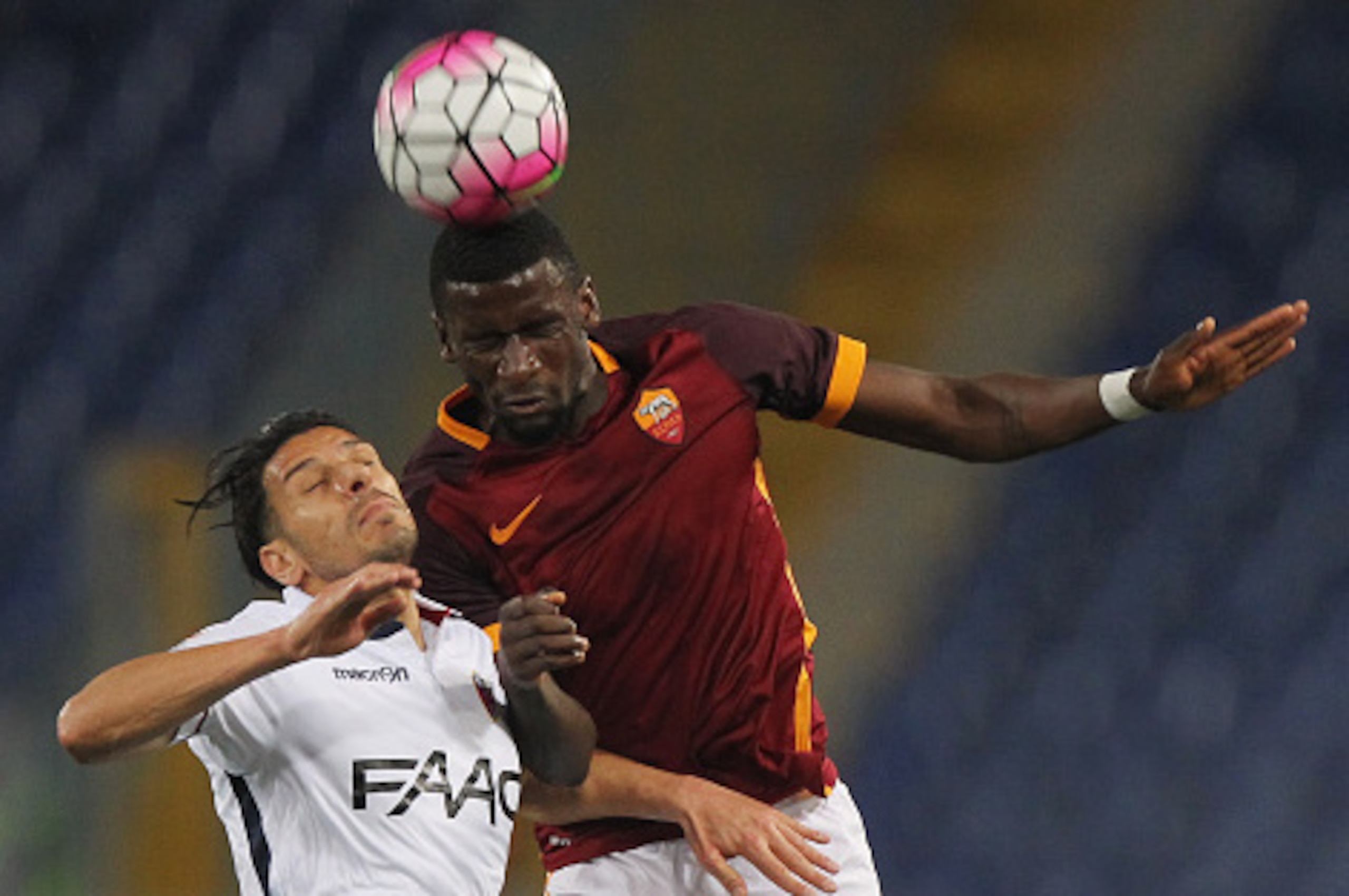 ROME, ITALY - APRIL 11:  Antonio Rudiger (R) of AS Roma competes for the ball with Sergio Floccari of Bologna FC during the Serie A match between AS Roma and Bologna FC at Stadio Olimpico on April 11, 2016 in Rome, Italy.  (Photo by Paolo Bruno/Getty Imag