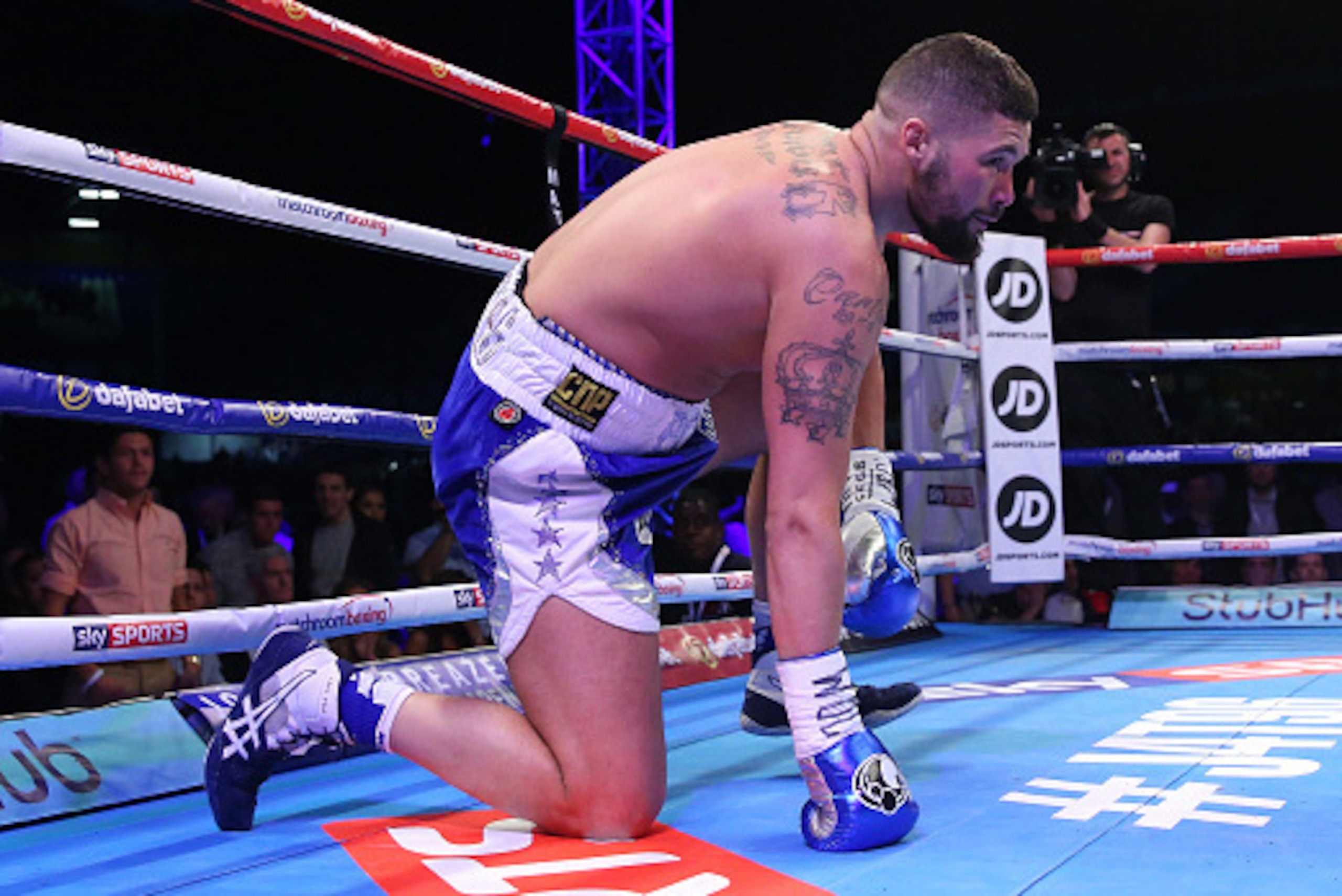 LIVERPOOL, ENGLAND - MAY 29:  Illunga Makabu knocks down Tony Bellew in the first round during the Vacant WBC World Cruiserweight Championship fight between Tony Bellew and Illunga Makabu at Goodison Park on May 29, 2016 in Liverpool, England.  (Photo by 