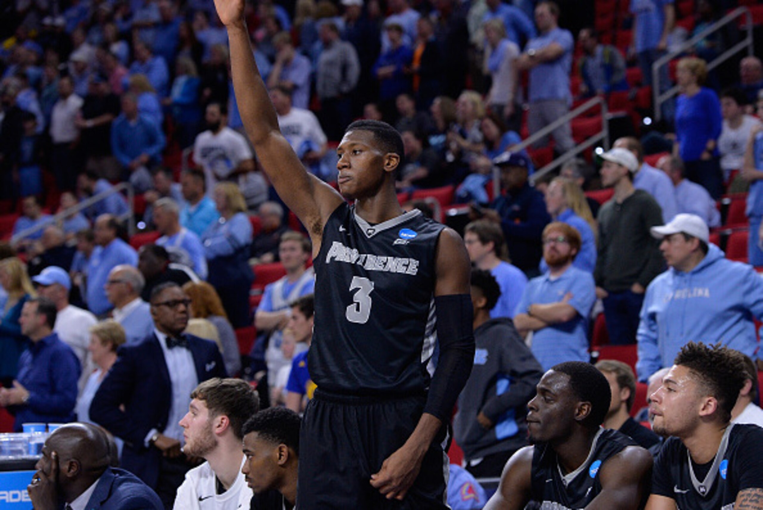 RALEIGH, NC - MARCH 19:  Kris Dunn #3 of the Providence Friars salutes the fans as they chant his name in the last minute of the game against the North Carolina Tar Heels in the second half during the second round of the 2016 NCAA Men's Basketball Tournam