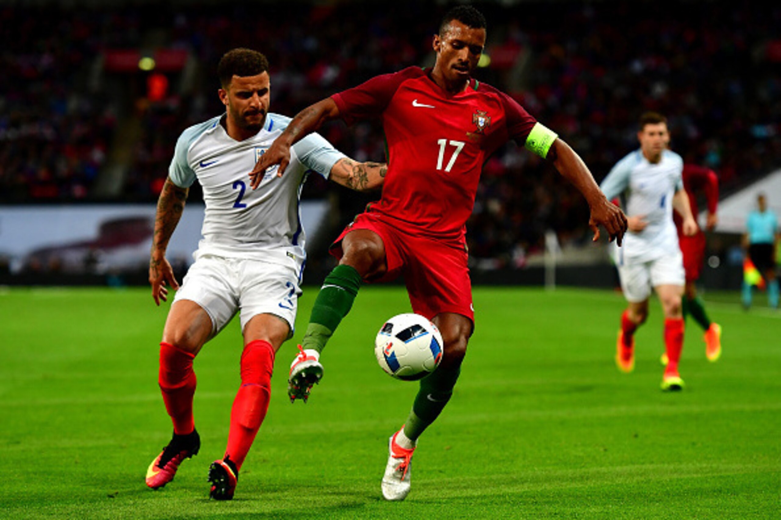 LONDON, ENGLAND - JUNE 02:  Nani of Portugal takes on Kyle Walker of England during the international friendly match between England and Portugal at Wembley Stadium on June 2, 2016 in London, England.  (Photo by Dan Mullan/Getty Images)