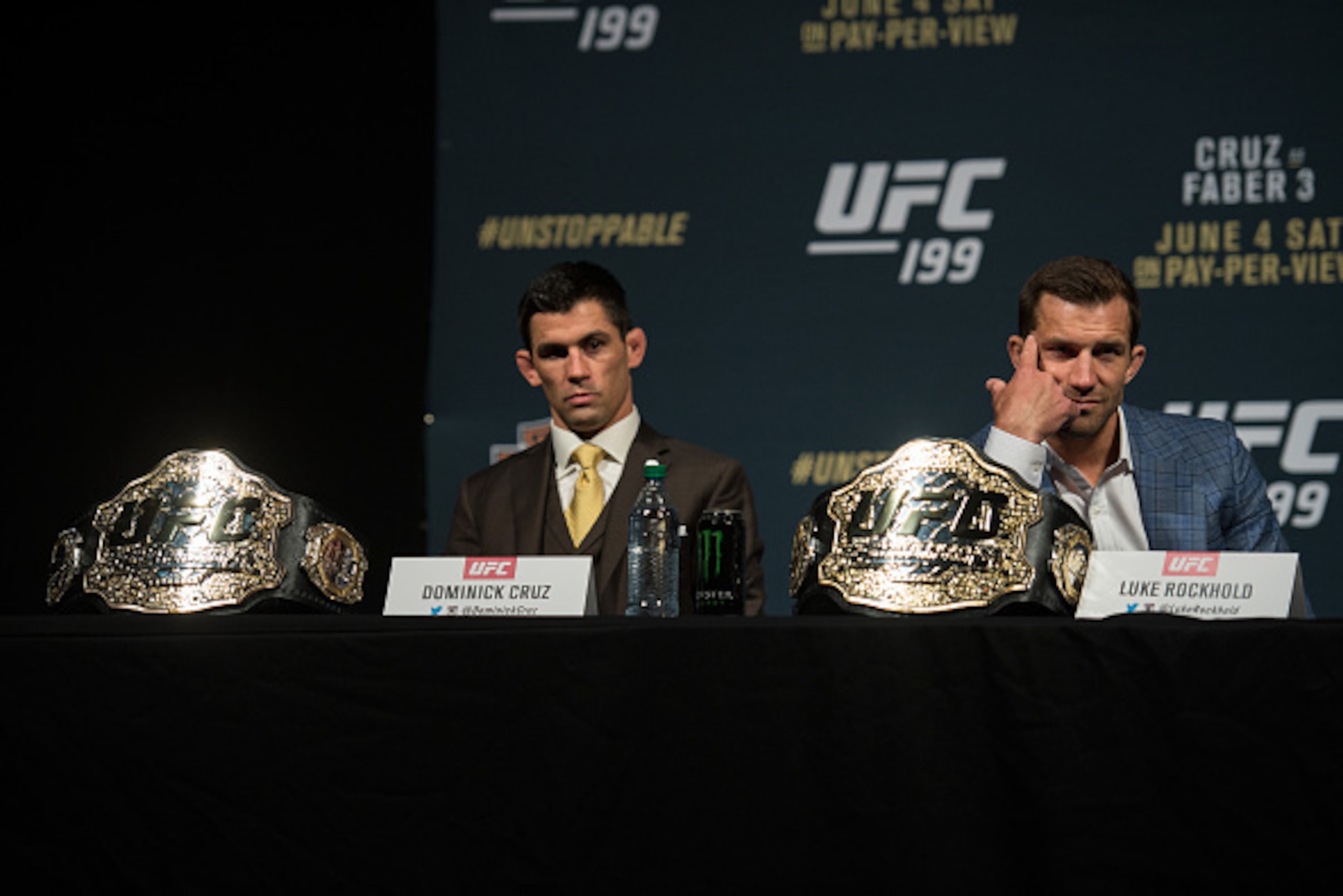 INGLEWOOD, CA - JUNE 02:   (L-R) Bantamweight champion Dominick Cruz and middleweight champion Luke Rockhold prepare to speak to the media during the UFC 199: Press Conference at the Forum on June 2, 2016 in Inglewood, California. (Photo by Brandon Magnus