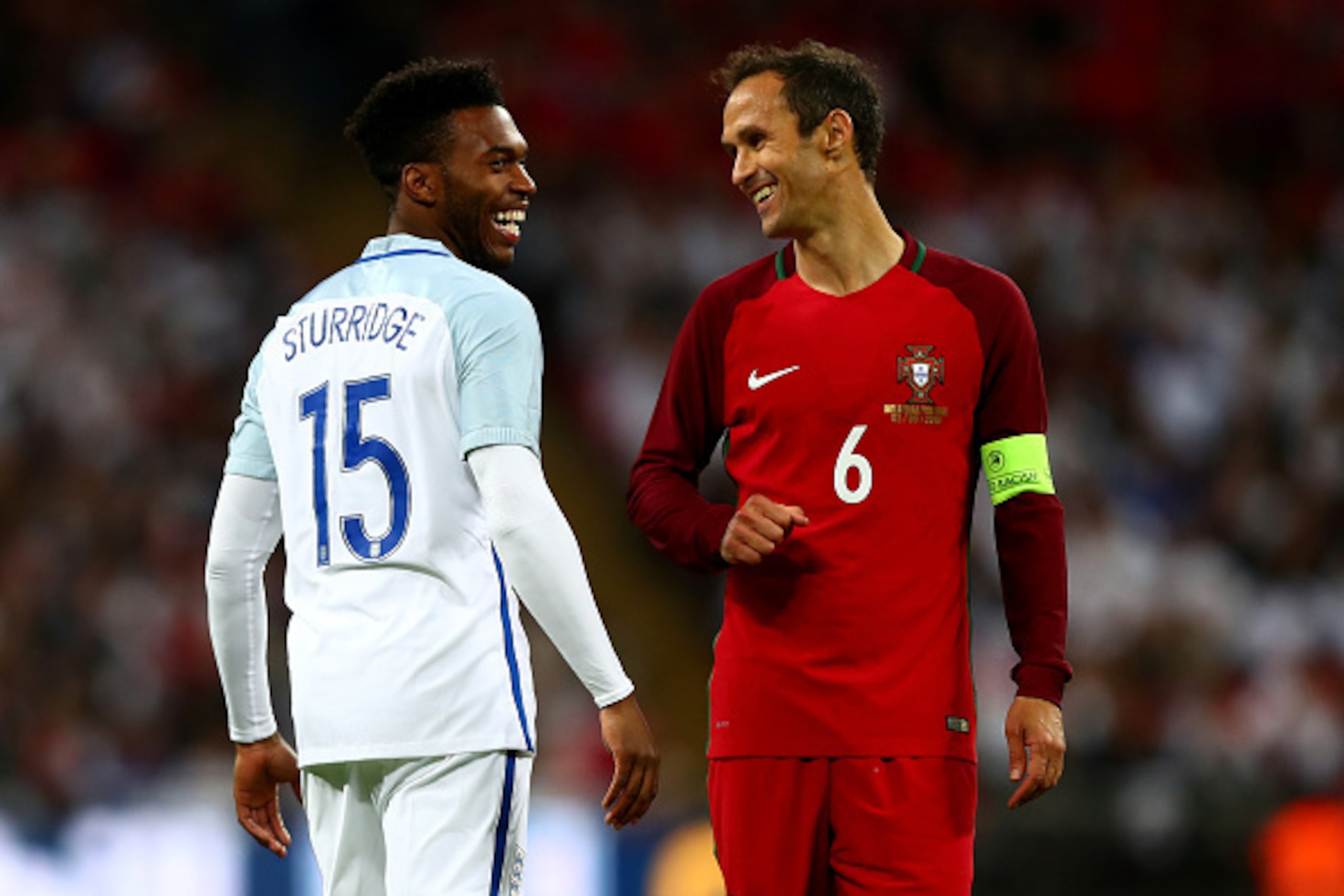 LONDON, ENGLAND - JUNE 02:  Daniel Sturridge of England and Ricardo Carvalho of Portugal smile during the international friendly match between England and Portugal at Wembley Stadium on June 2, 2016 in London, England.  (Photo by Clive Rose/Getty Images)