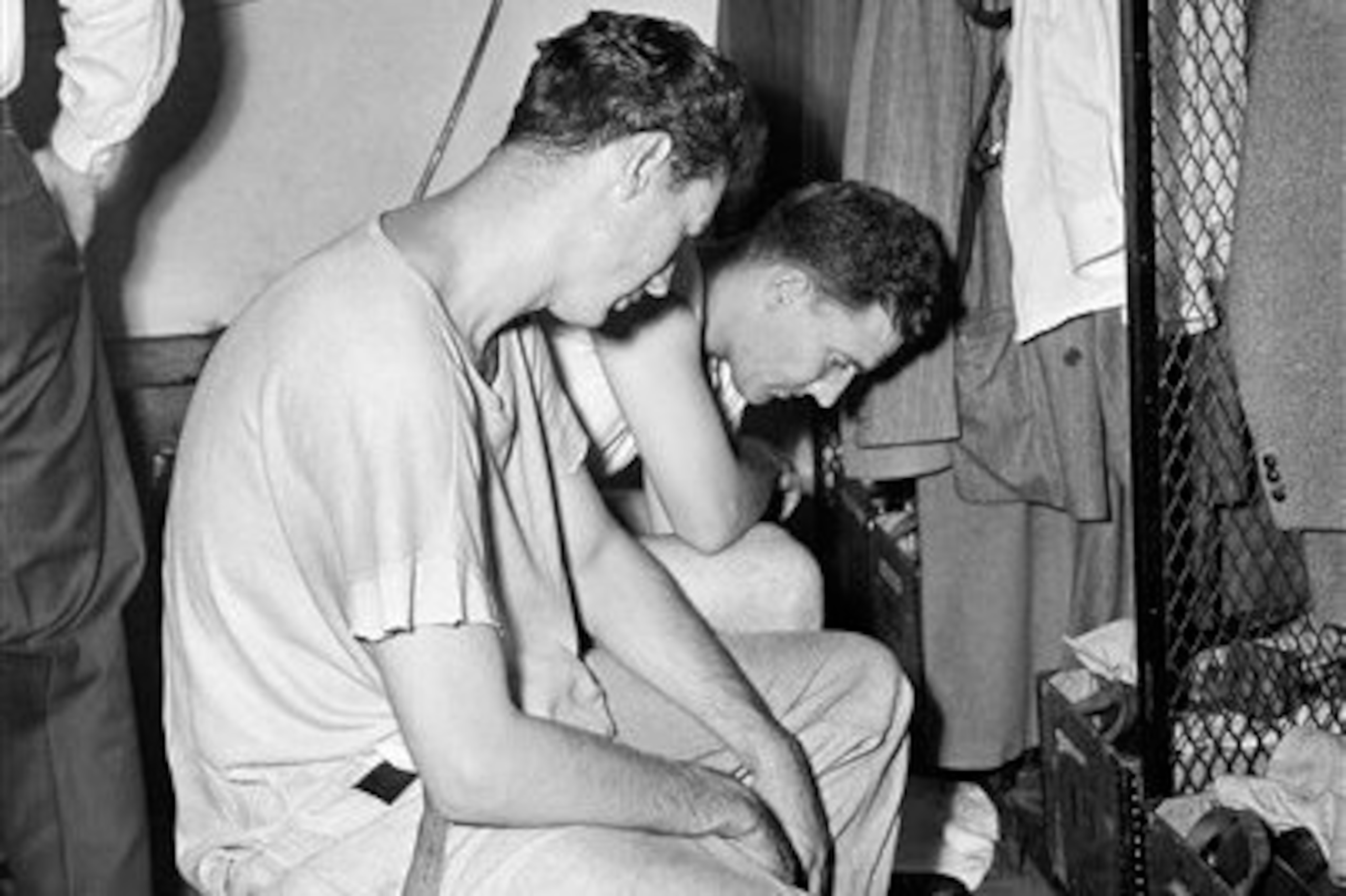 Ted Williams (left) and Mickey Harris (right) dejected after losing 1946 World Series