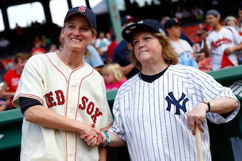 BOSTON, MA - JULY 08:  Claudia Williams, left, daughter of former Boston Red Sox player Ted Williams, poses for a portrait with Linda Ruth Tosetti, right, granddaughter of former New York Yankees player Babe Ruth, prior to the game between the Boston Red 