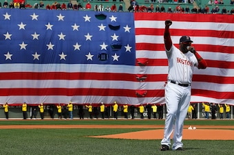 BOSTON, MA - APRIL 20:  David Ortiz #34 of the Boston Red Sox speaks during a pre-game ceremony in honor of the bombings of Marathon Monday before a game at Fenway Park on April 20, 2013 in Boston, Massachusetts.  (Photo by Jim Rogash/Getty Images)
