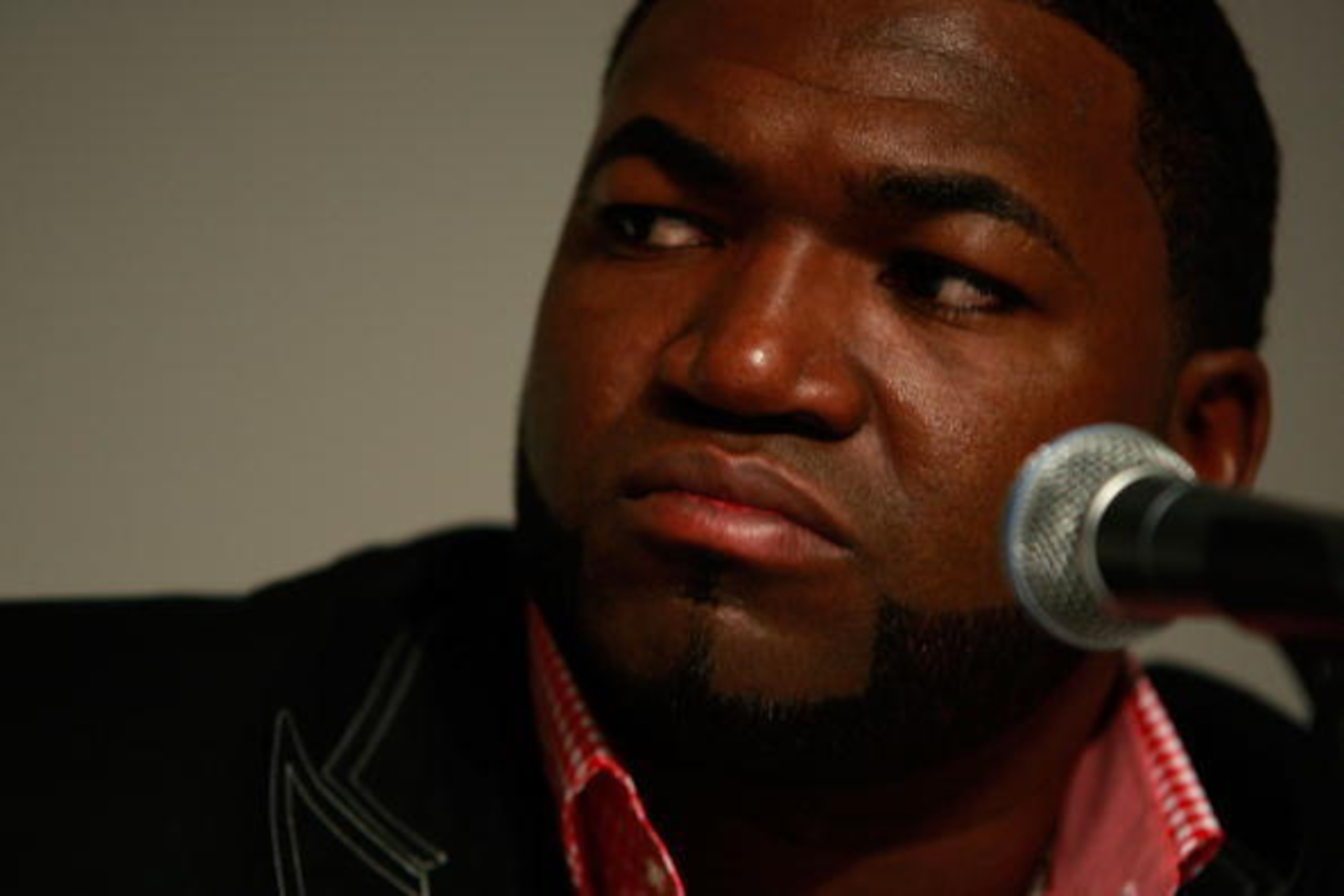 NEW YORK - AUGUST 08:  David Ortiz of the Boston Red Sox speaks to the media regarding his positive test for a performance enhancing substance as part of the 2003 Survey Test during a press conference at Yankee Stadium on  August 8, 2009 in the Bronx boro