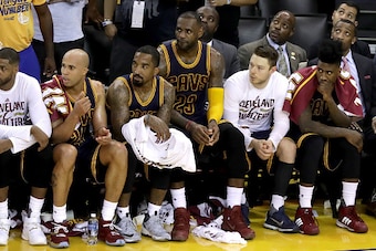 OAKLAND, CA - JUNE 02:  Tristan Thompson #13, Richard Jefferson #24, J.R. Smith #5, LeBron James #23, Matthew Dellavedova #8 and Iman Shumpert #4 of the Cleveland Cavaliers sit on the bench late in the fourth quarter against the Cleveland Cavaliers in Gam