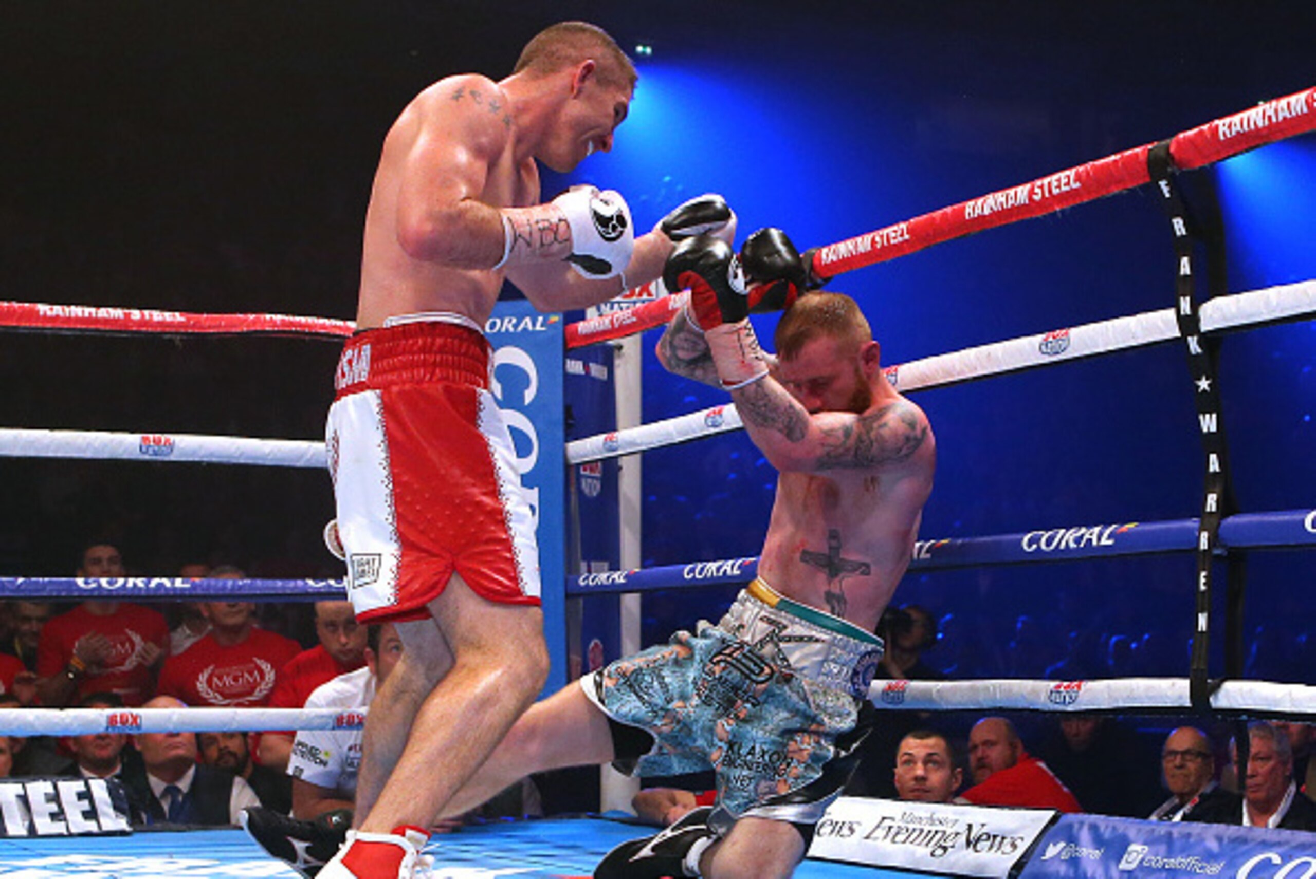 MANCHESTER, ENGLAND - DECEMBER 19: Liam Smith stands over Jimmy Kelly during their WBO World Super Welterweight title fight at the Manchester Arena on December 19, 2015 in Manchester, England. (Photo by Dave Thompson/Getty Images)