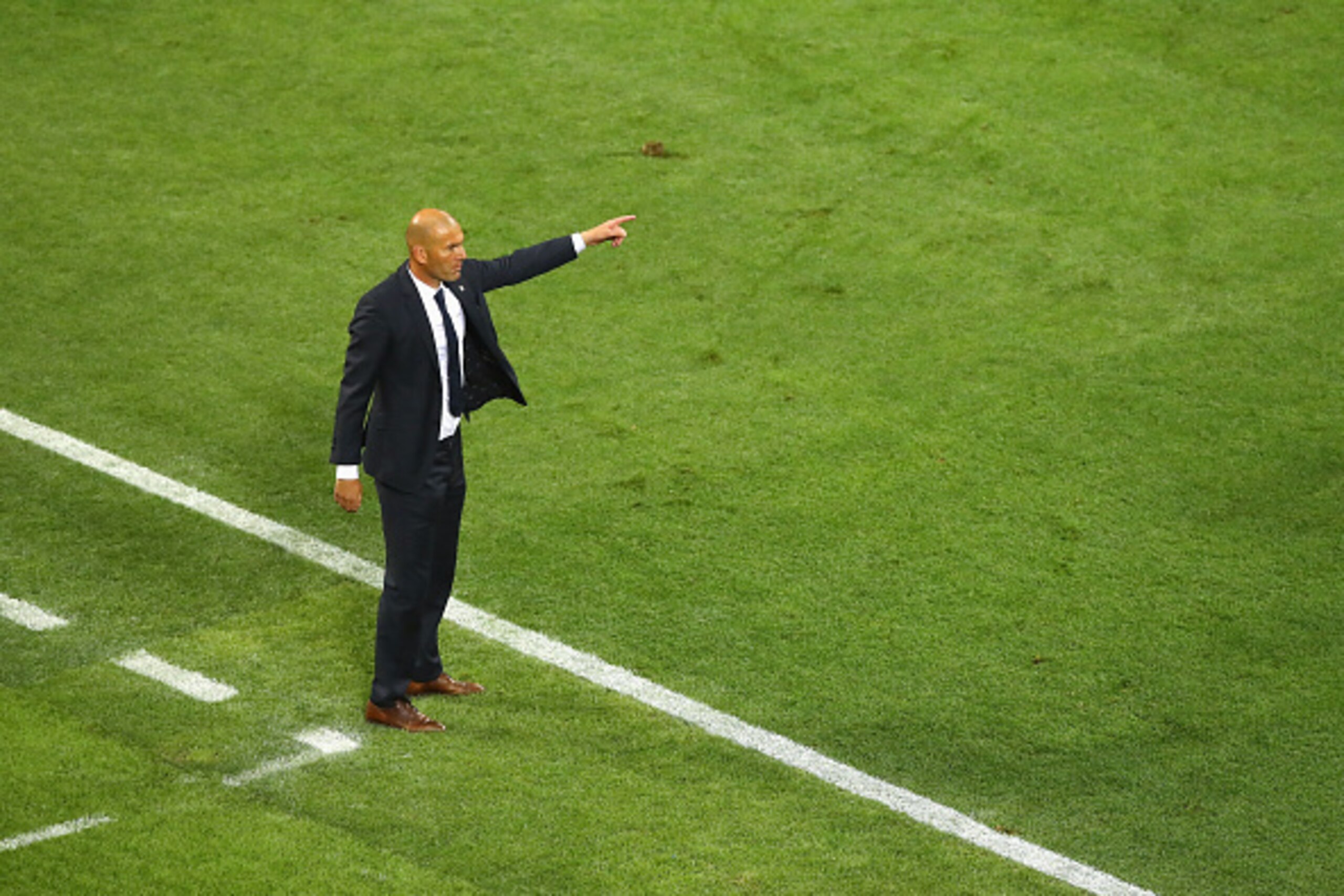 MILAN, ITALY - MAY 28:  Head coach Zinedine Zidane of Real Madrid gestures during the UEFA Champions League Final match between Real Madrid and Club Atletico de Madrid at Stadio Giuseppe Meazza on May 28, 2016 in Milan, Italy.  (Photo by Dean Mouhtaropoul
