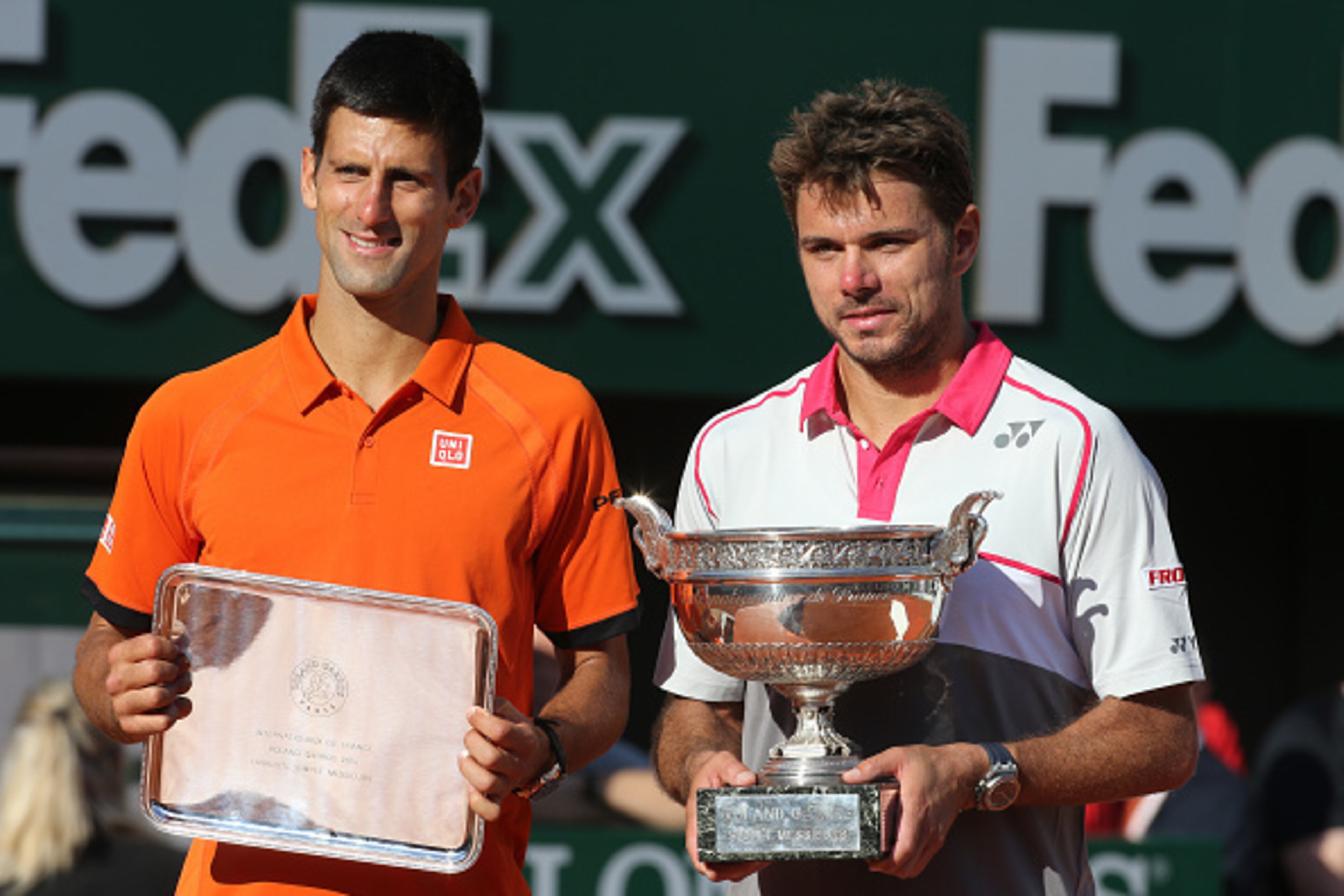 PARIS, FRANCE - JUNE 7: Stanislas Wawrinka of Switzerland (right) poses with the Coupe de Mousquetaires and runner up Novak Djokovic of Serbia  after the men's final on day 15 of the French Open 2015 at Roland Garros stadium on June 1, 2015 in Paris, Fran