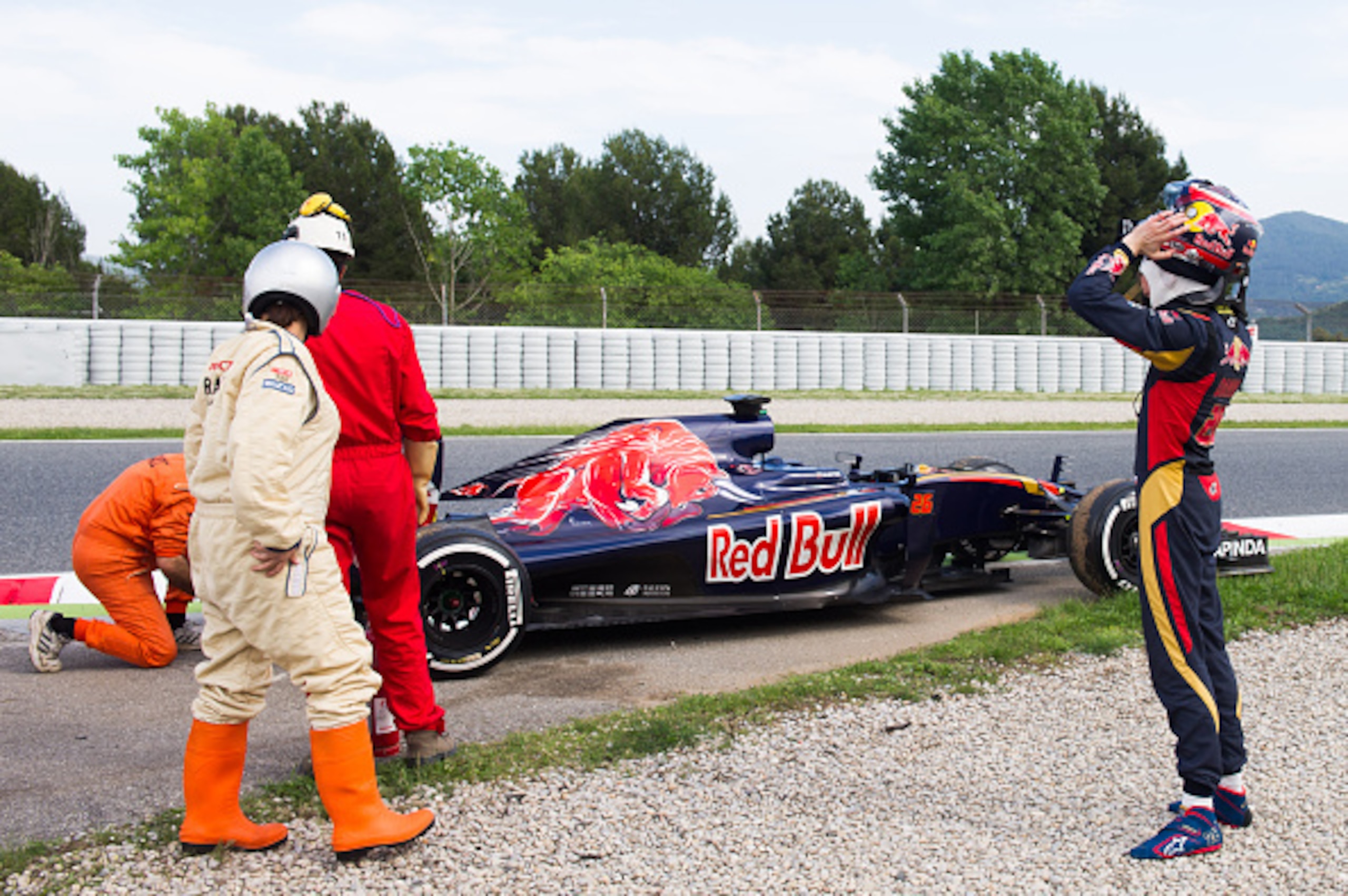 MONTMELO, SPAIN - MAY 18:  Daniil Kvyat of Russia looks at the Scuderia Toro Rosso STR11 Ferrari 060/5 turbo after stopping in the track during day two of F1 in-season tests at Circuit de Catalunya on May 18, 2016 in Montmelo, Spain.  (Photo by Alex Capar