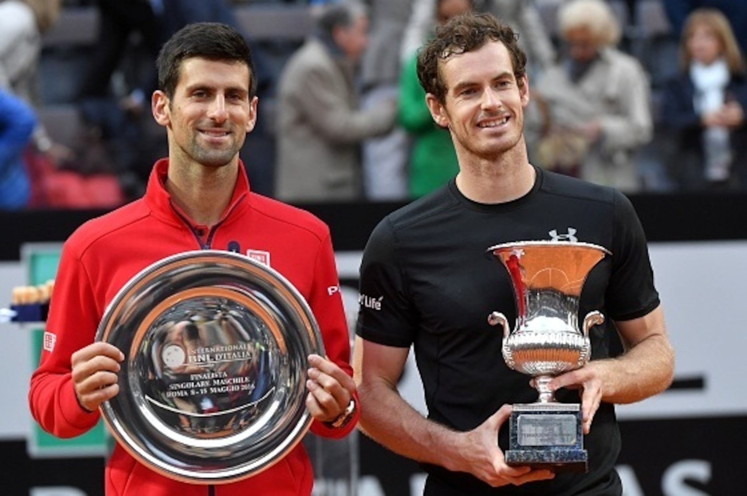 Britain's Andy Murray poses next to Novak Djokovic of Serbia after after winning the men's final match at the ATP Tennis Open on May 15, 2016 at the Foro Italico in Rome. / AFP / TIZIANA FABI        (Photo credit should read TIZIANA FABI/AFP/Getty Images)