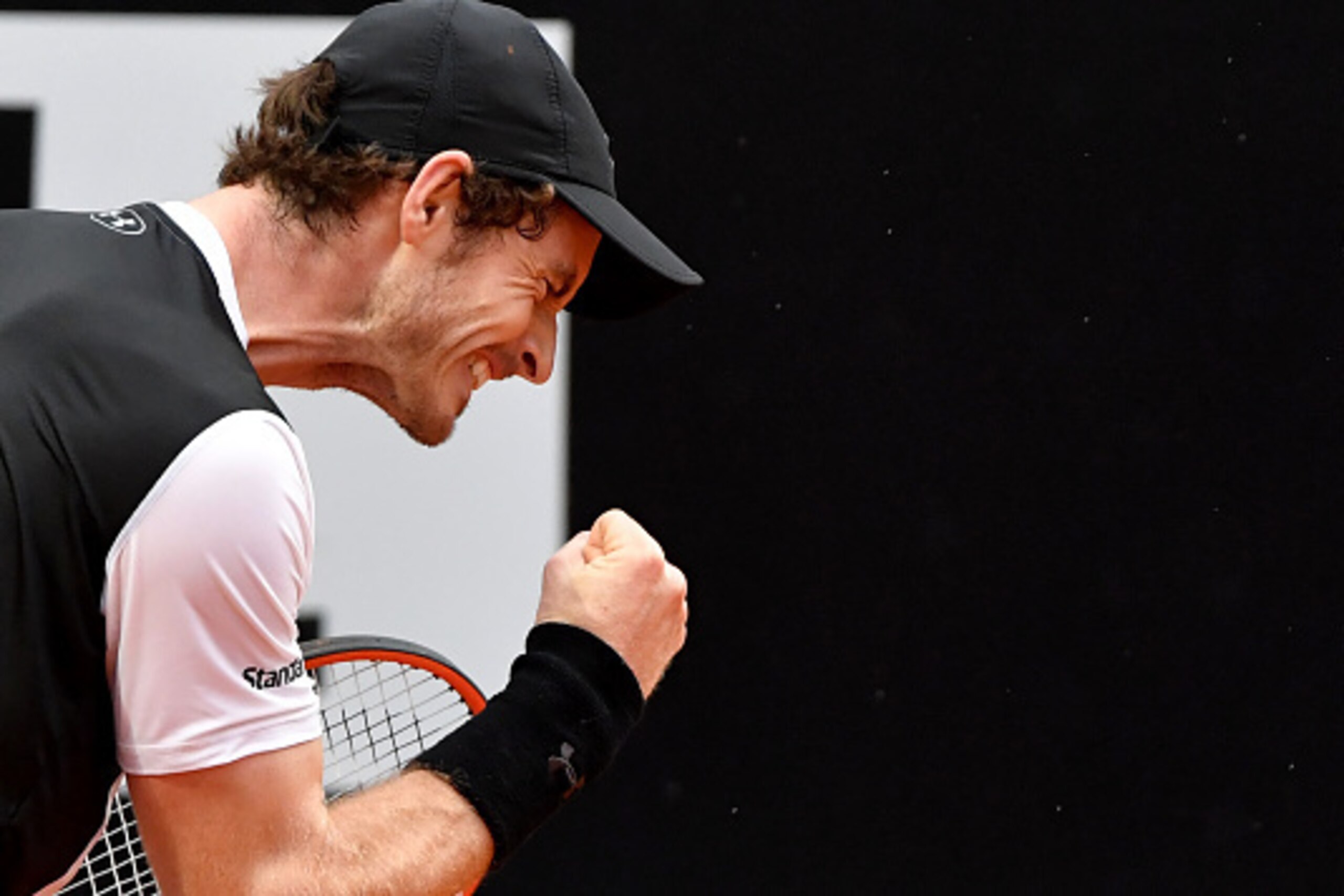 Andy Murray of Great Britain celebrates against Serbian Novak Djokovic during the final match of the ATP Tennis Open tournament game at the Foro Italico in Rome on May 15, 2016. / AFP / TIZIANA FABI        (Photo credit should read TIZIANA FABI/AFP/Getty