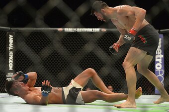 INGLEWOOD, CA - JUNE 04:  Dong Hyun Kim of South Korea and Polo Reyes of Mexico during their lightweight during the UFC 199 event at The Forum on June 4, 2016 in Inglewood, California.  Polo Reyes won by knockout. (Photo by Jayne Kamin-Oncea/Getty Images)