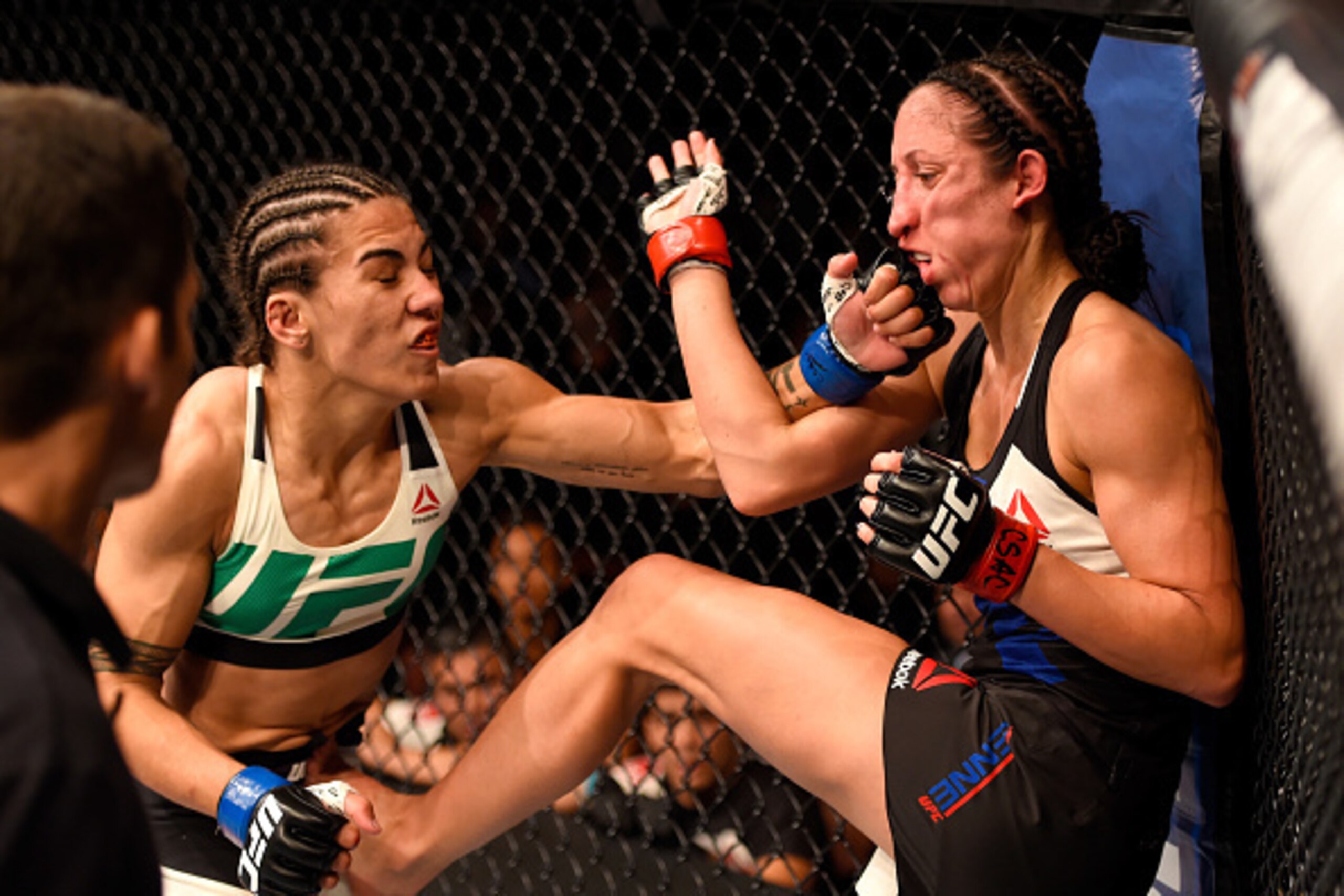 INGLEWOOD, CA - JUNE 04:  Jessica Andrade of Brazil punches Jessica Penne in their women's strawweight bout during the UFC 199 event at The Forum on June 4, 2016 in Inglewood, California.  (Photo by Josh Hedges/Zuffa LLC/Zuffa LLC via Getty Images)