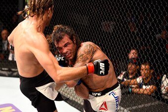INGLEWOOD, CA - JUNE 04:  Brian Ortega kicks Clay Guida in their featherweight bout during the UFC 199 event at The Forum on June 4, 2016 in Inglewood, California.  (Photo by Josh Hedges/Zuffa LLC/Zuffa LLC via Getty Images)