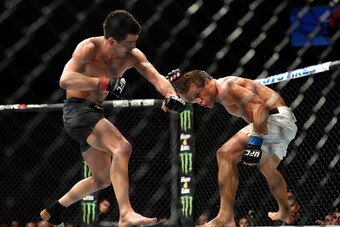 INGLEWOOD, CA - JUNE 04: Dominick Cruz throws a left punch at Urijah Faber during the UFC 199 event at The Forum on June 4, 2016 in Inglewood, California.  (Photo by Brandon Magnus/Zuffa LLC/Zuffa LLC via Getty Images)