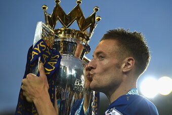 LEICESTER, ENGLAND - MAY 07: Jamie Vardy of Leicester City kisses the Premier League Trophy after the Barclays Premier League match between Leicester City and Everton at The King Power Stadium on May 7, 2016 in Leicester, United Kingdom.  (Photo by Lauren