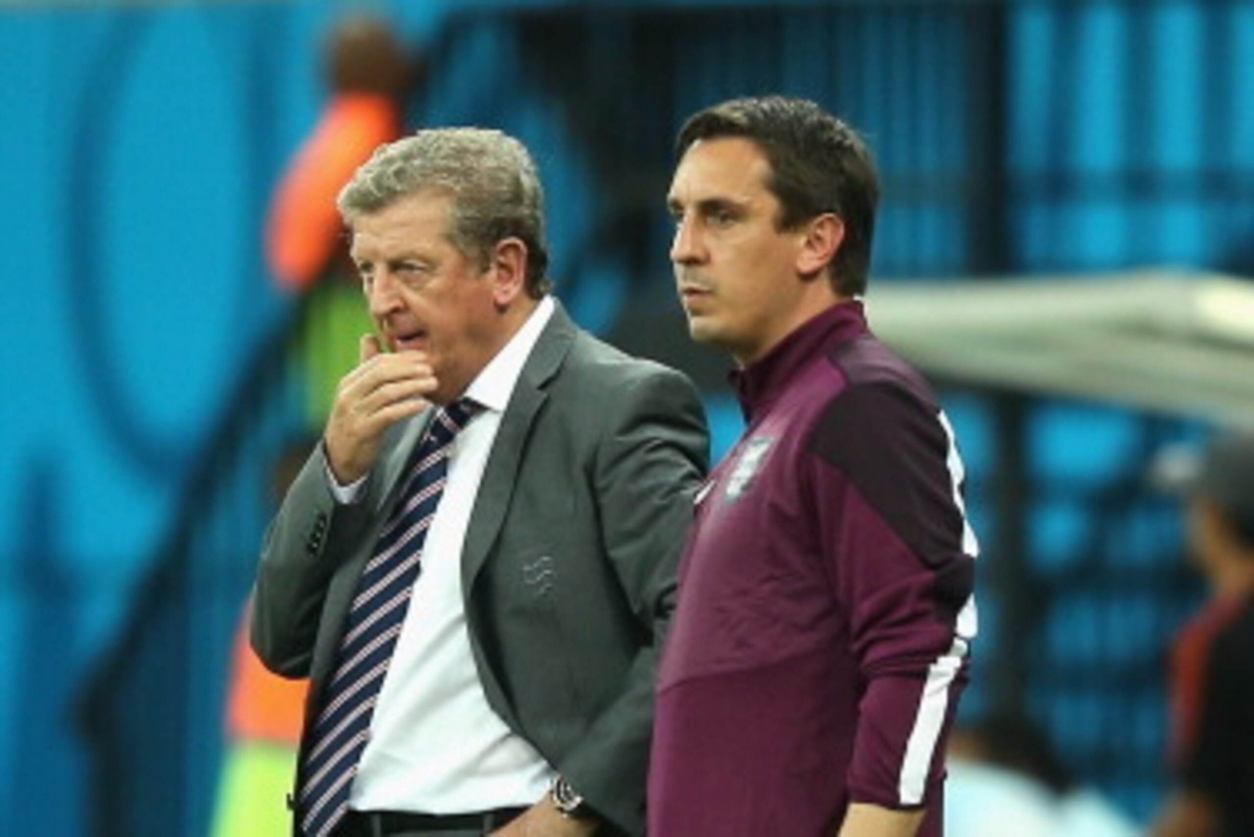 MANAUS, BRAZIL - JUNE 14:  Team manager Roy Hodgson of England and Gary Neville look on during the 2014 FIFA World Cup Brazil Group D match between England and Italy at Arena Amazonia on June 14, 2014 in Manaus, Brazil.  (Photo by Richard Heathcote/Getty 