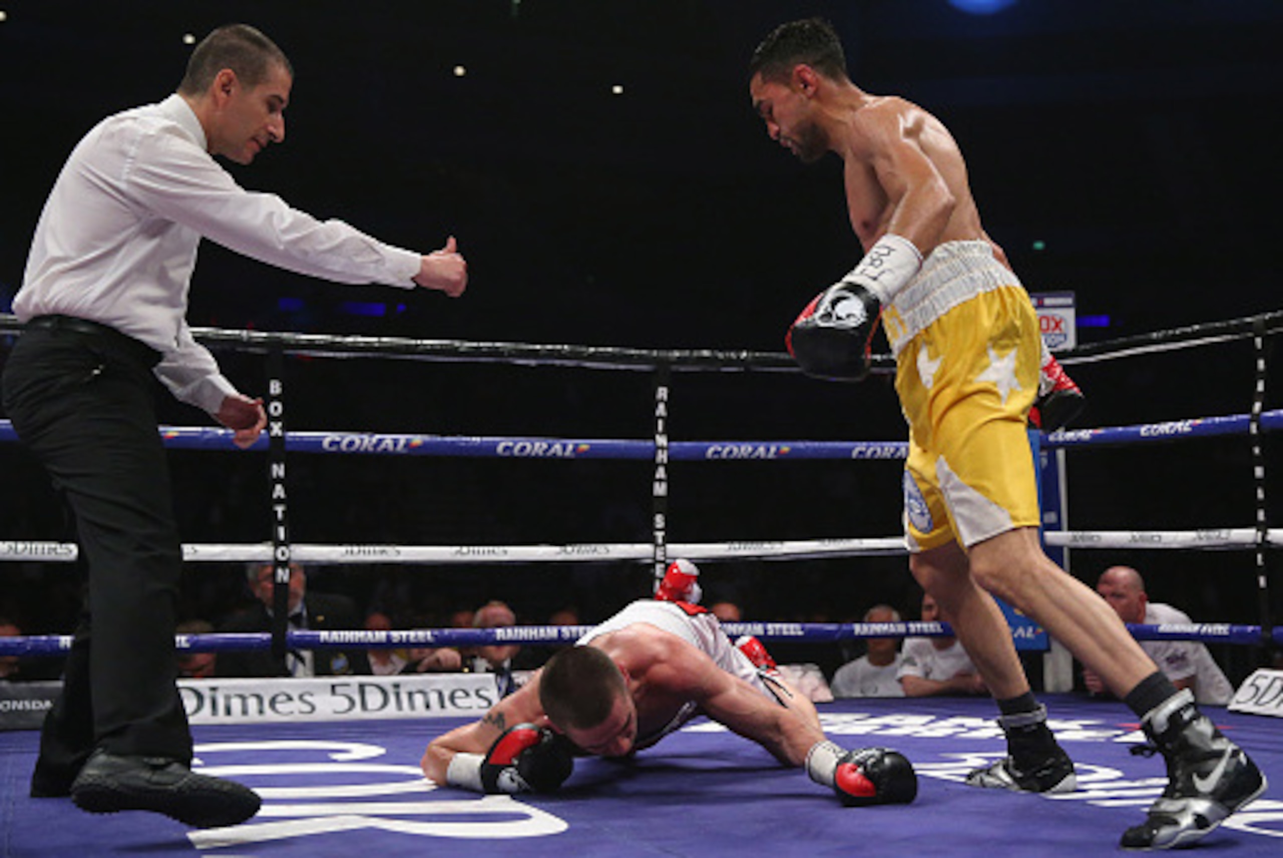 LIVERPOOL, ENGLAND - JUNE 04:  Karim Guerfi of France knocks out Ryan Farrag of Great Britain to win The EBU European Bantamweight Championship fight between Ryan Farrag and Karim Guerfi at Echo Arena on June 4, 2016 in Liverpool, England.  (Photo by Alex
