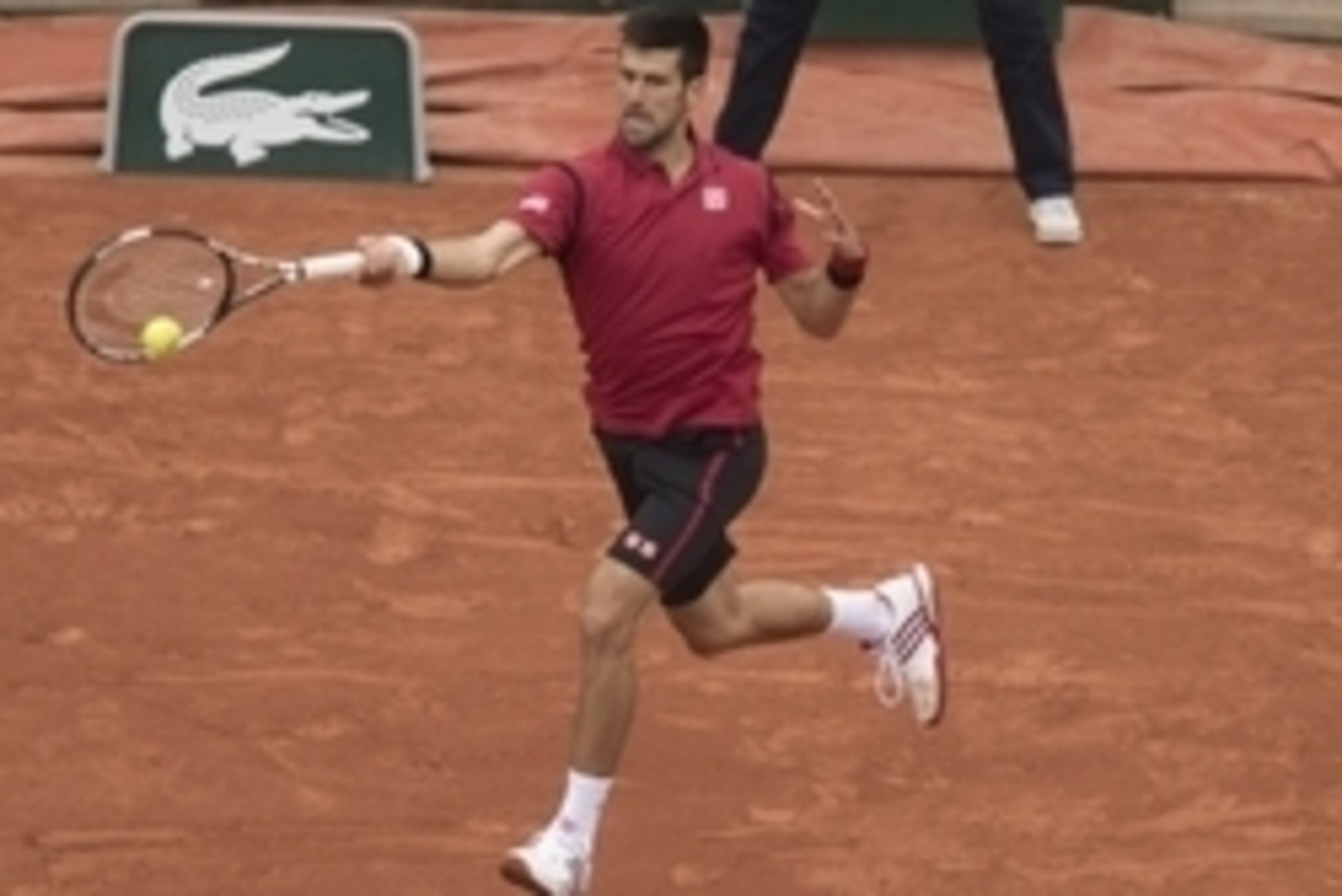June 3, 2016; Paris, France; Novak Djokovic (SRB) in action during his match against Dominic Thiem (AUT) on day 13 of the 2016 French Open. Mandatory Credit: Susan Mullane-USA TODAY Sports