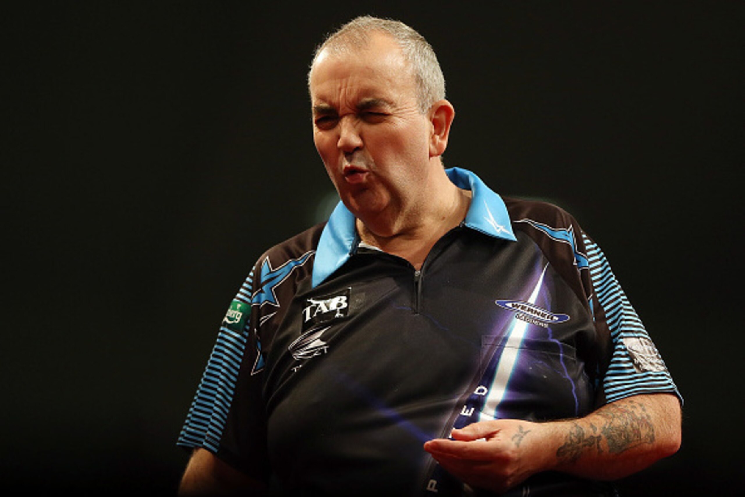 AUCKLAND, NEW ZEALAND - AUGUST 30:  Phil Taylor in action during the Auckland Darts Masters at The Trusts Arena on August 30, 2015 in Auckland, New Zealand.  (Photo by Michael Bradley/Getty Images)