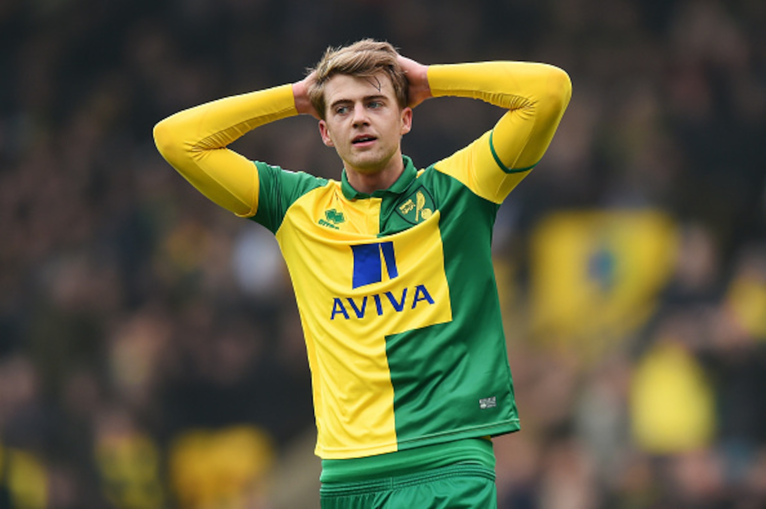 NORWICH, ENGLAND - MARCH 12: Patrick Bamford of Norwich City reacts after his shot hitting a bar during the Barclays Premier League match between Norwich City and Manchester City at Carrow Road on March 12, 2016 in Norwich, England.  (Photo by Michael Reg
