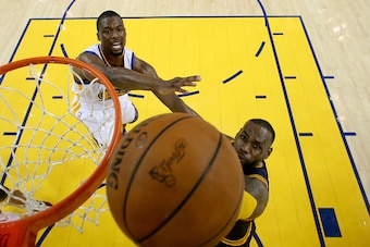 OAKLAND, CA - JUNE 02:  LeBron James #23 of the Cleveland Cavaliers goes up for a shot in the lane against Harrison Barnes #40 of the Golden State Warriors in the second half in Game 1 of the 2016 NBA Finals at ORACLE Arena on June 2, 2016 in Oakland, Cal