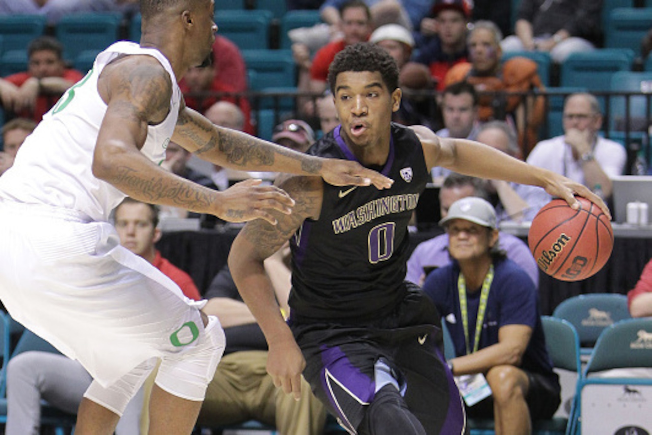 LAS VEGAS, NV - MARCH 10: Marquese Chriss #0 of the Washington Huskies handles the ball against Elgin Cook #23 of the Oregon Ducks during a quarterfinal game of the Pac-12 Basketball Tournament at MGM Grand Garden Arena on March 10, 2016 in Las Vegas, Nev LAS VEGAS, NV - MARCH 10: Marquese Chriss #0 of the Washington Huskies handles the ball against Elgin Cook #23 of the Oregon Ducks during a quarterfinal game of the Pac-12 Basketball Tournament at MGM Grand Garden Arena on March 10, 2016 in Las Vegas, Nev