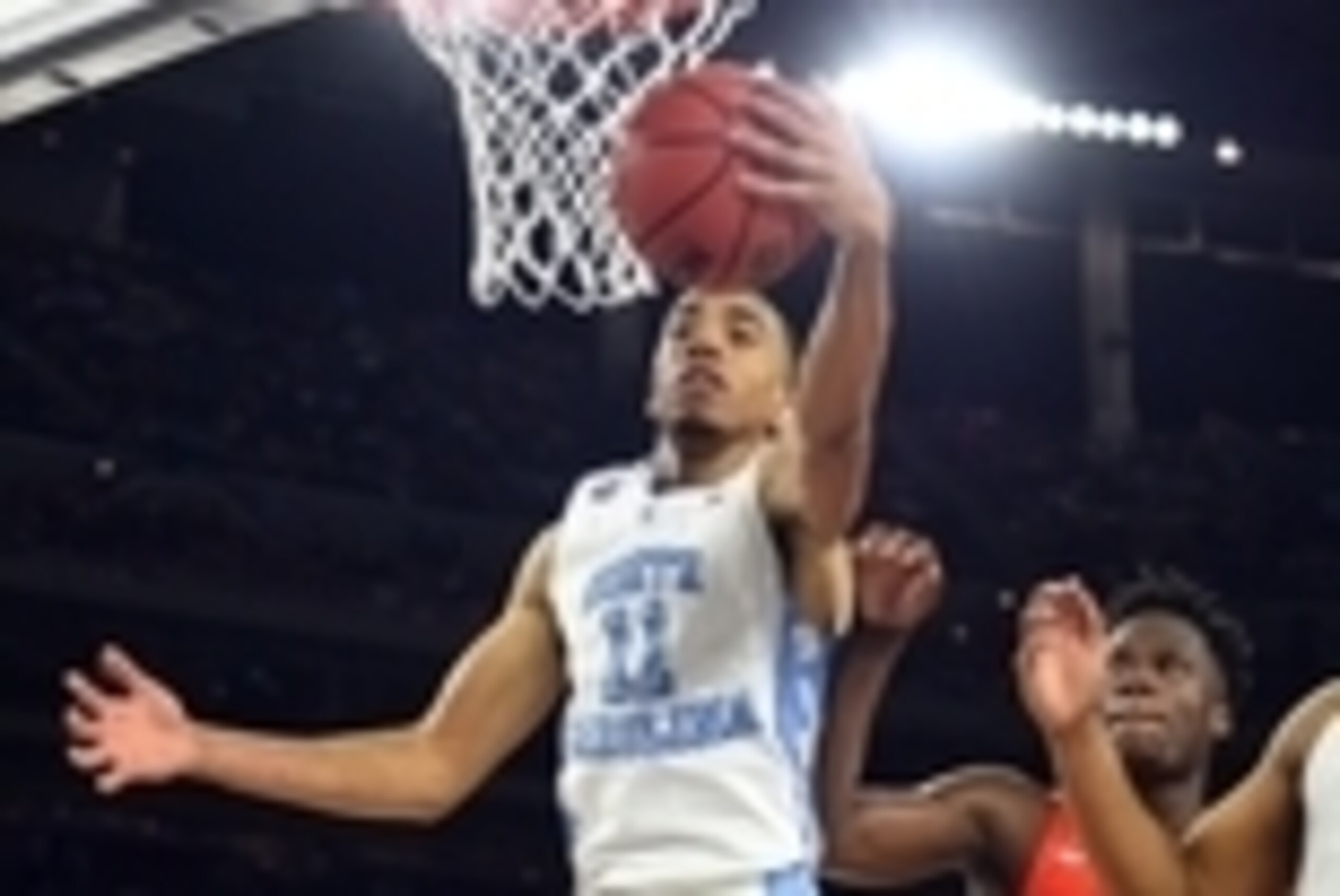 Apr 2, 2016; Houston, TX, USA; North Carolina Tar Heels forward Brice Johnson (11) grabs a rebound against Syracuse Orange forward Tyler Roberson (21) during the second half in the 2016 NCAA Men's Division I Championship semi-final game at NRG Stadium. Ma Apr 2, 2016; Houston, TX, USA; North Carolina Tar Heels forward Brice Johnson (11) grabs a rebound against Syracuse Orange forward Tyler Roberson (21) during the second half in the 2016 NCAA Men's Division I Championship semi-final game at NRG Stadium. Ma