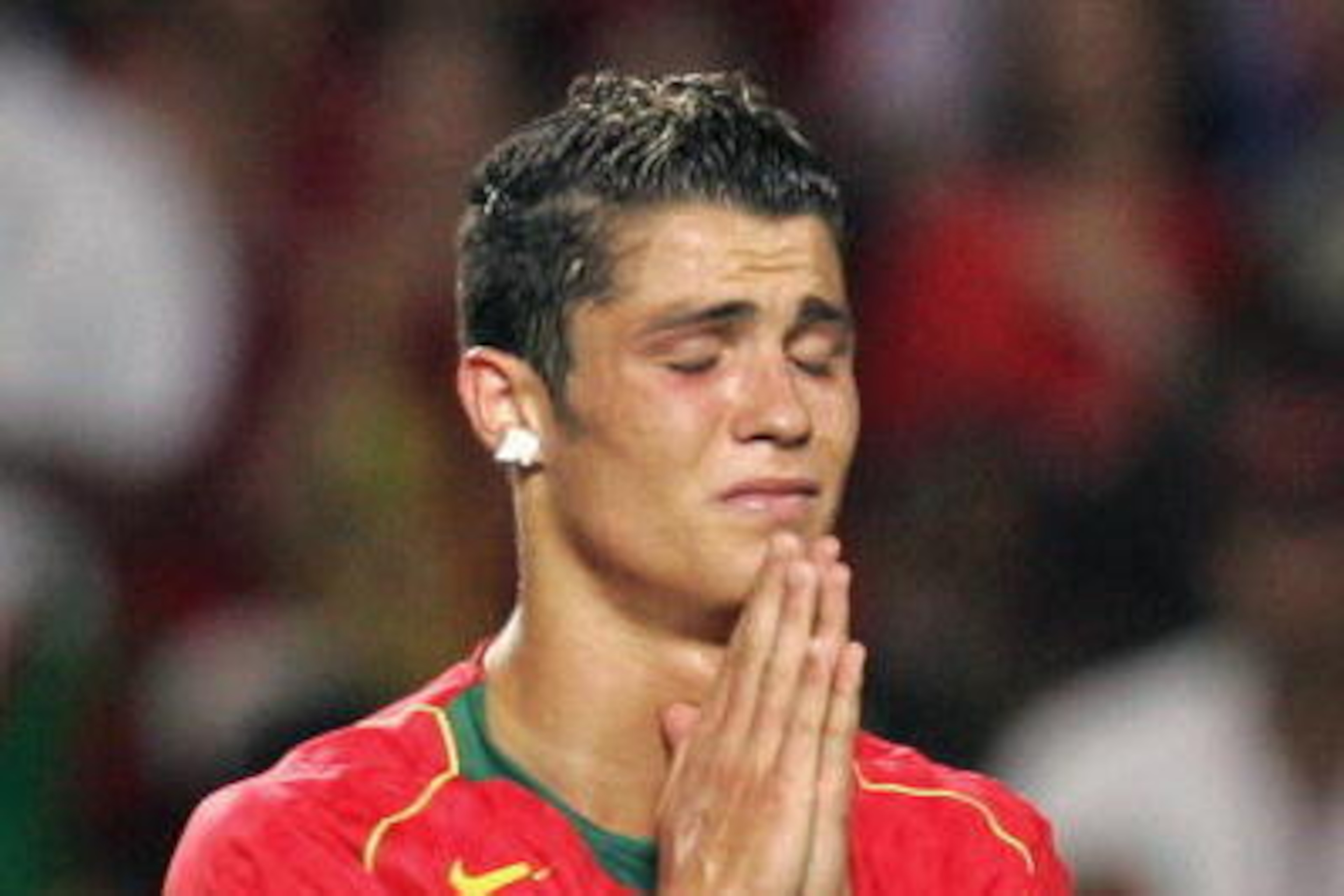LISBON, Portugal:  Portuguese forward Cristiano Ronaldo reacts after missing a chance to score, 04 July 2004 at the Luz stadium in Lisbon during the Euro 2004 final football match between Portugal and Greece at the European Championship in Portugual.  AFP