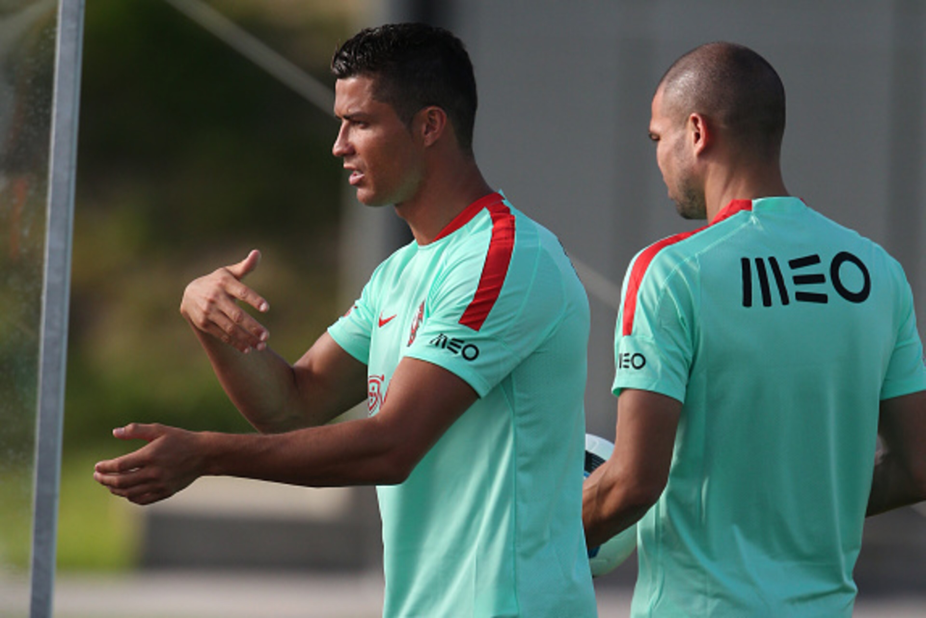 OEIRAS, PORTUGAL - JUNE 5:  Portugal's forward Cristiano Ronaldo and Portugal's defender Pepe during Portugal's National Training session in preparation for the Euro 2016 at FPF Cidade do Futebol (City of Football) on June 5, 2016 in Oeiras (Lisbon), Port