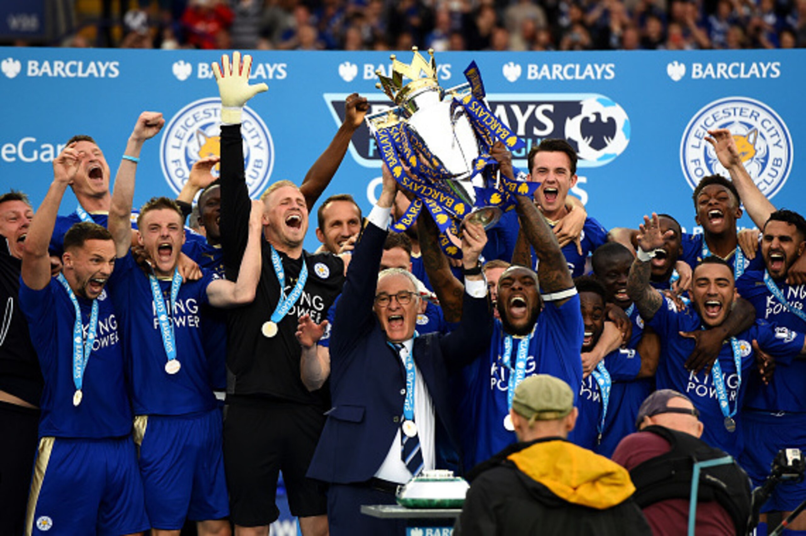 LEICESTER, ENGLAND - MAY 07: Captain Wes Morgan and manager Claudio Ranieri of Leicester City lift the Premier League Trophy after the Barclays Premier League match between Leicester City and Everton at The King Power Stadium on May 7, 2016 in Leicester, LEICESTER, ENGLAND - MAY 07: Captain Wes Morgan and manager Claudio Ranieri of Leicester City lift the Premier League Trophy after the Barclays Premier League match between Leicester City and Everton at The King Power Stadium on May 7, 2016 in Leicester,