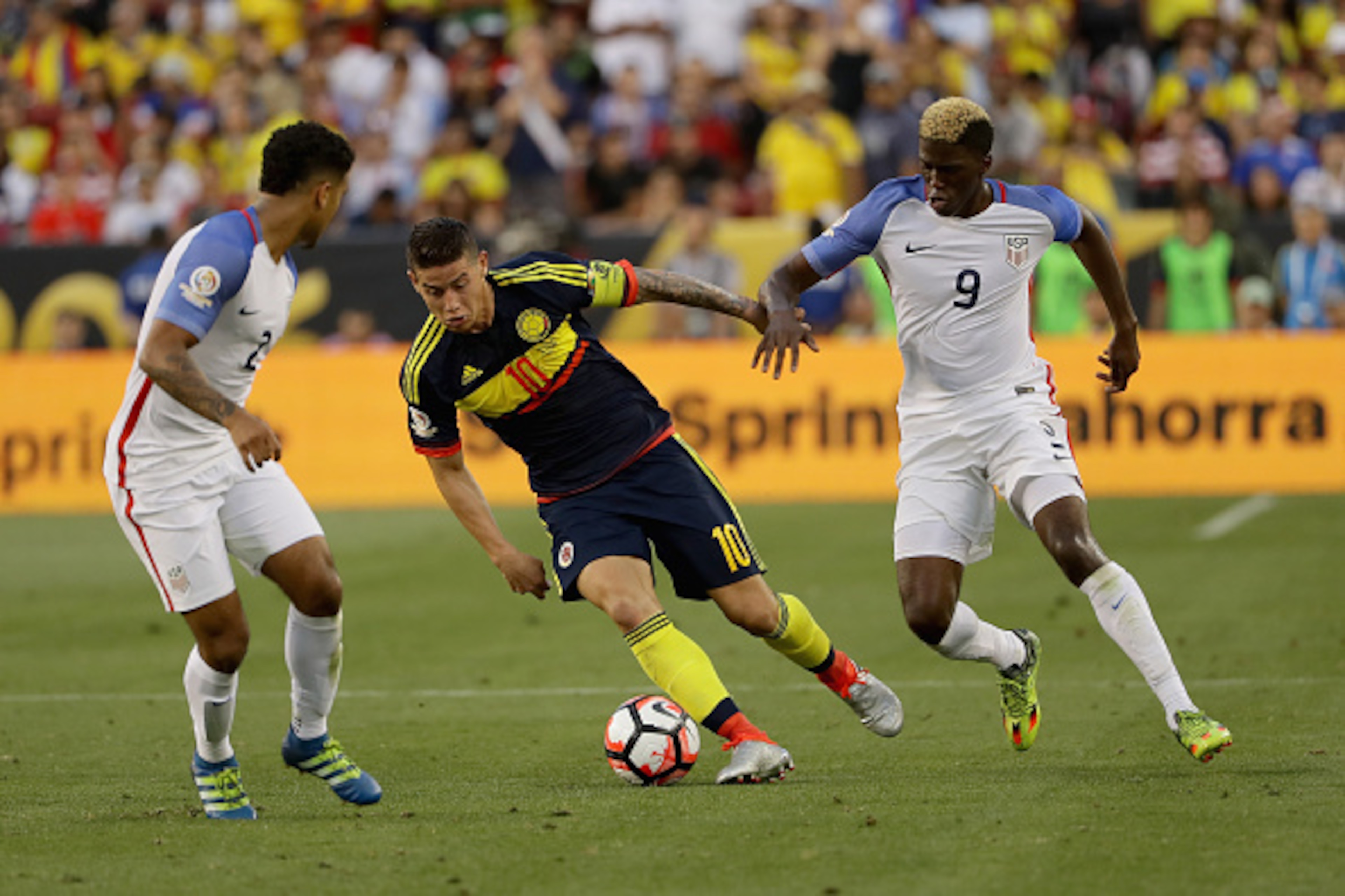 SANTA CLARA, CA - JUNE 03:  James Rodriguez #10 of Colombia tries to dribble away from Gyasi Zardes #9 of United States during the 2016 Copa America Centenario Group match between the United States and Colombia at Levi's Stadium on June 3, 2016 in Santa C