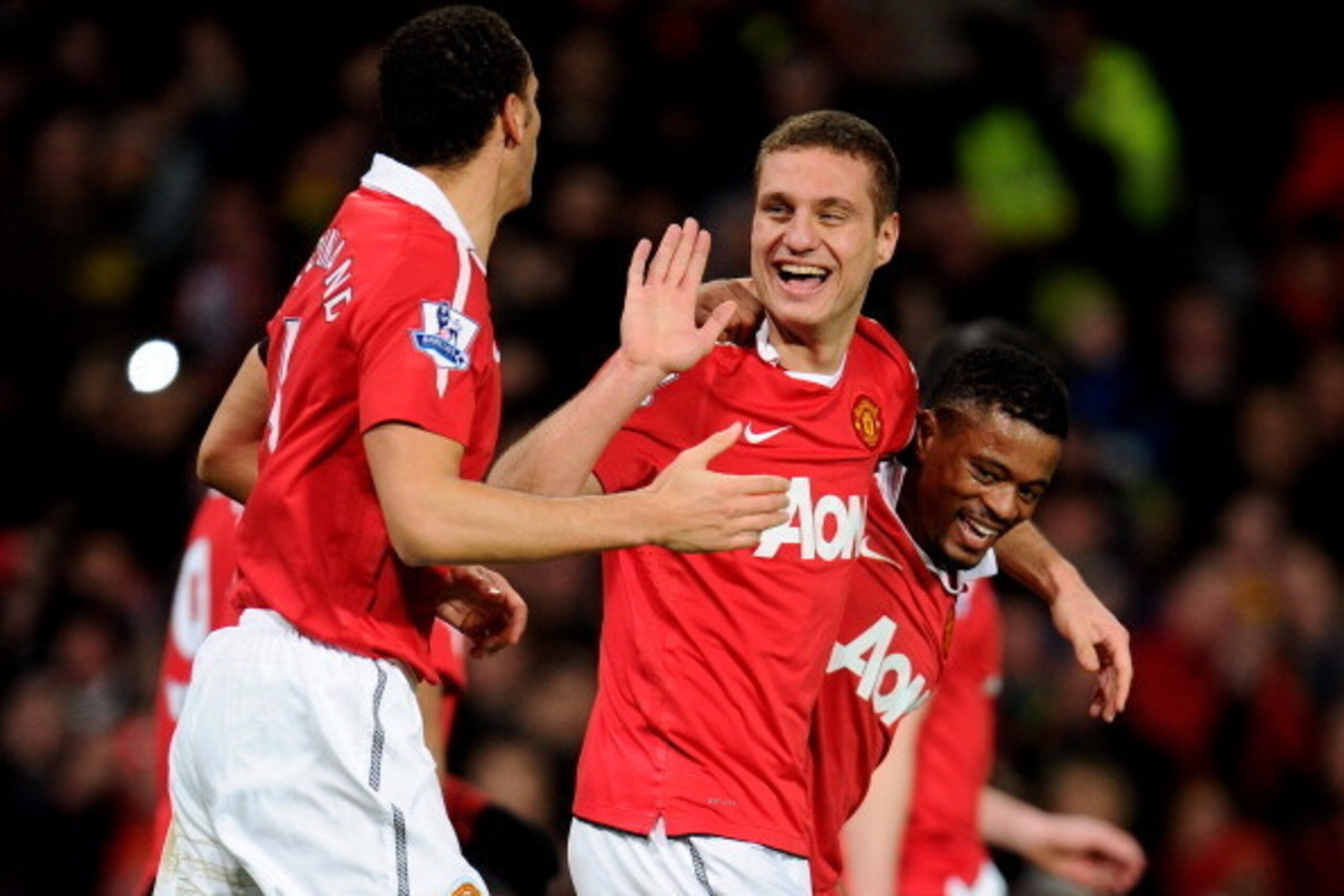 MANCHESTER, ENGLAND - FEBRUARY 01: Nemanja Vidic of Manchester United celebrates scoring his team's third goal with team mates Rio Ferdinand and Patrice Evra (R) during the Barclays Premier League match between Manchester United and Aston Villa at Old Tr MANCHESTER, ENGLAND - FEBRUARY 01: Nemanja Vidic of Manchester United celebrates scoring his team's third goal with team mates Rio Ferdinand and Patrice Evra (R) during the Barclays Premier League match between Manchester United and Aston Villa at Old Tr