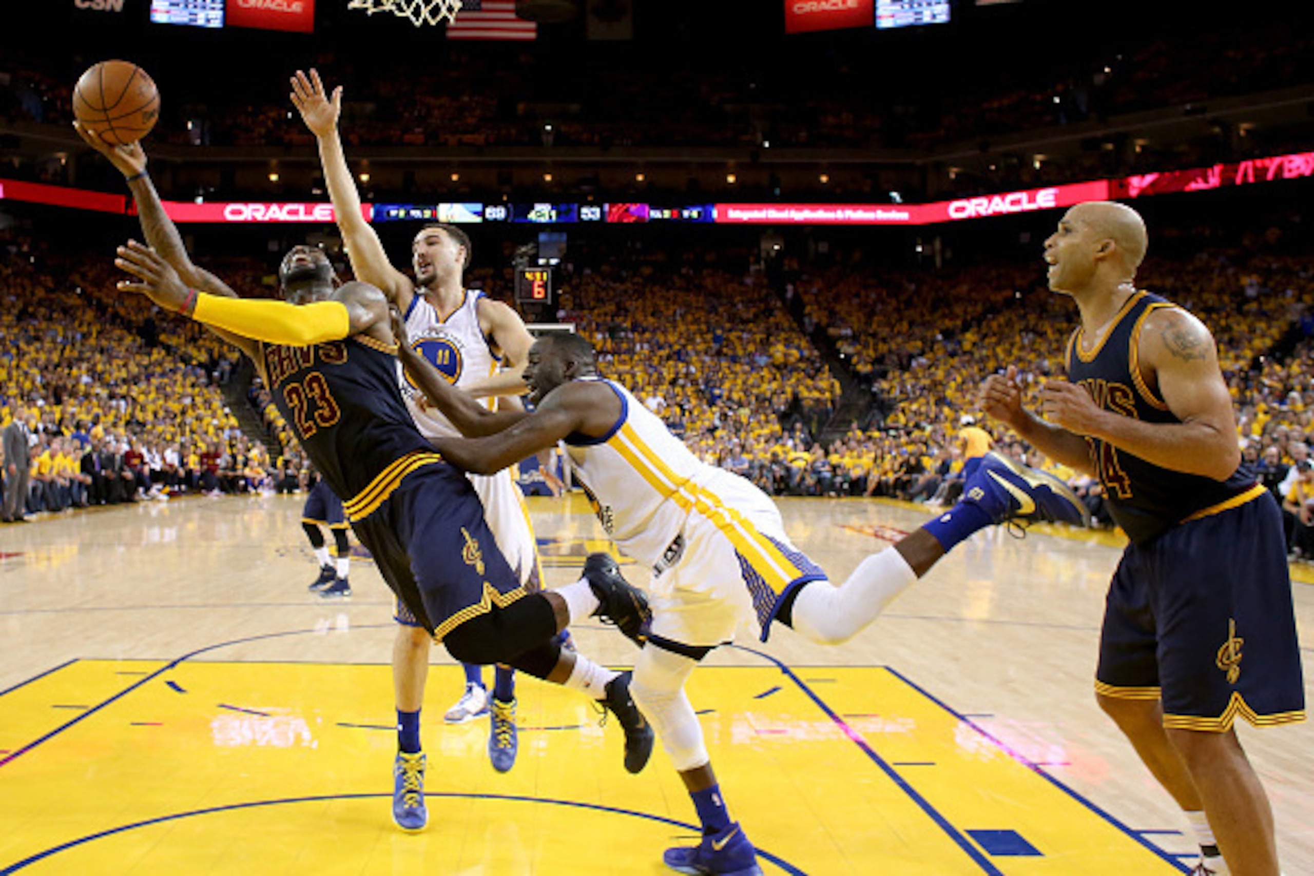 OAKLAND, CA - JUNE 05:  LeBron James #23 of the Cleveland Cavaliers goes up for a shot against Draymond Green #23 of the Golden State Warriors in Game 2 of the 2016 NBA Finals at ORACLE Arena on June 5, 2016 in Oakland, California. NOTE TO USER: User expr