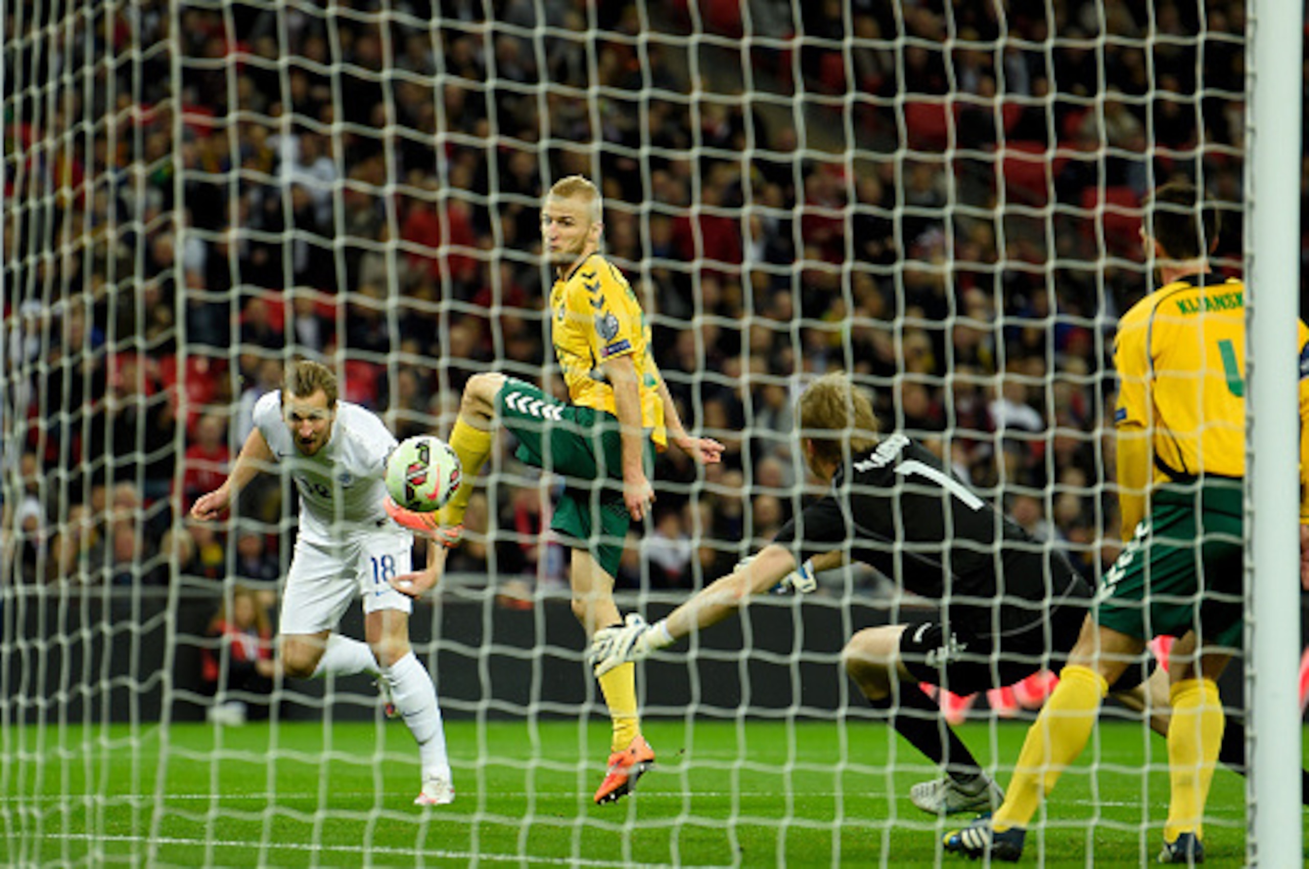 LONDON, ENGLAND - MARCH 27:  Harry Kane of England scores the fourth goal during the EURO 2016 Qualifier match between England and Lithuania at Wembley Stadium on March 27, 2015 in London, England.  (Photo by Mike Hewitt/Getty Images)
