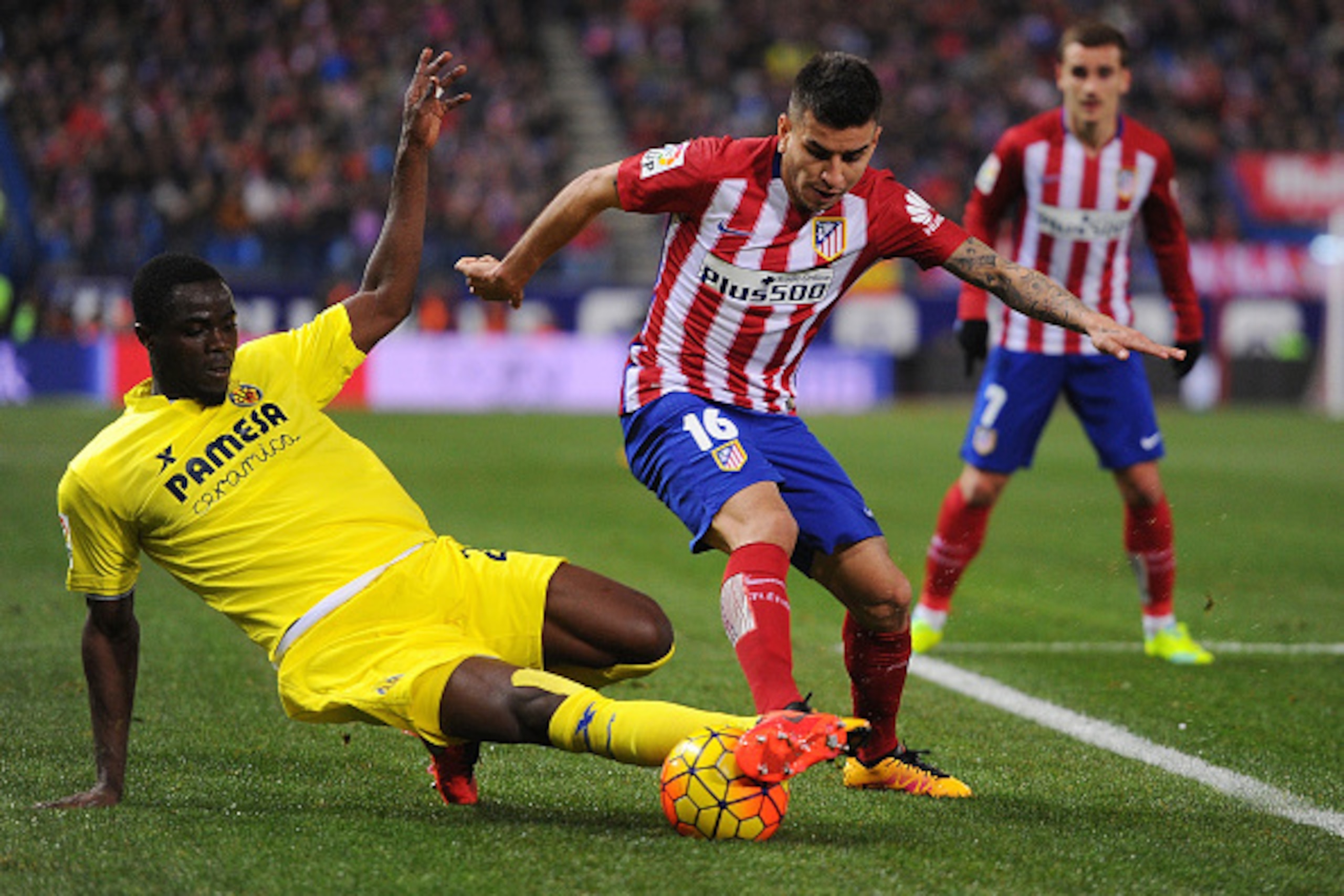 MADRID, SPAIN - FEBRUARY 21:  Eric Bailly of Villarreal CF takes the ball from  Angel Correa of Club Atletico de Madrid during the La Liga match between Club Atletico de Madrid and Villarreal CF at Vicente Calderon Stadium on February 21, 2016 in Madrid, 