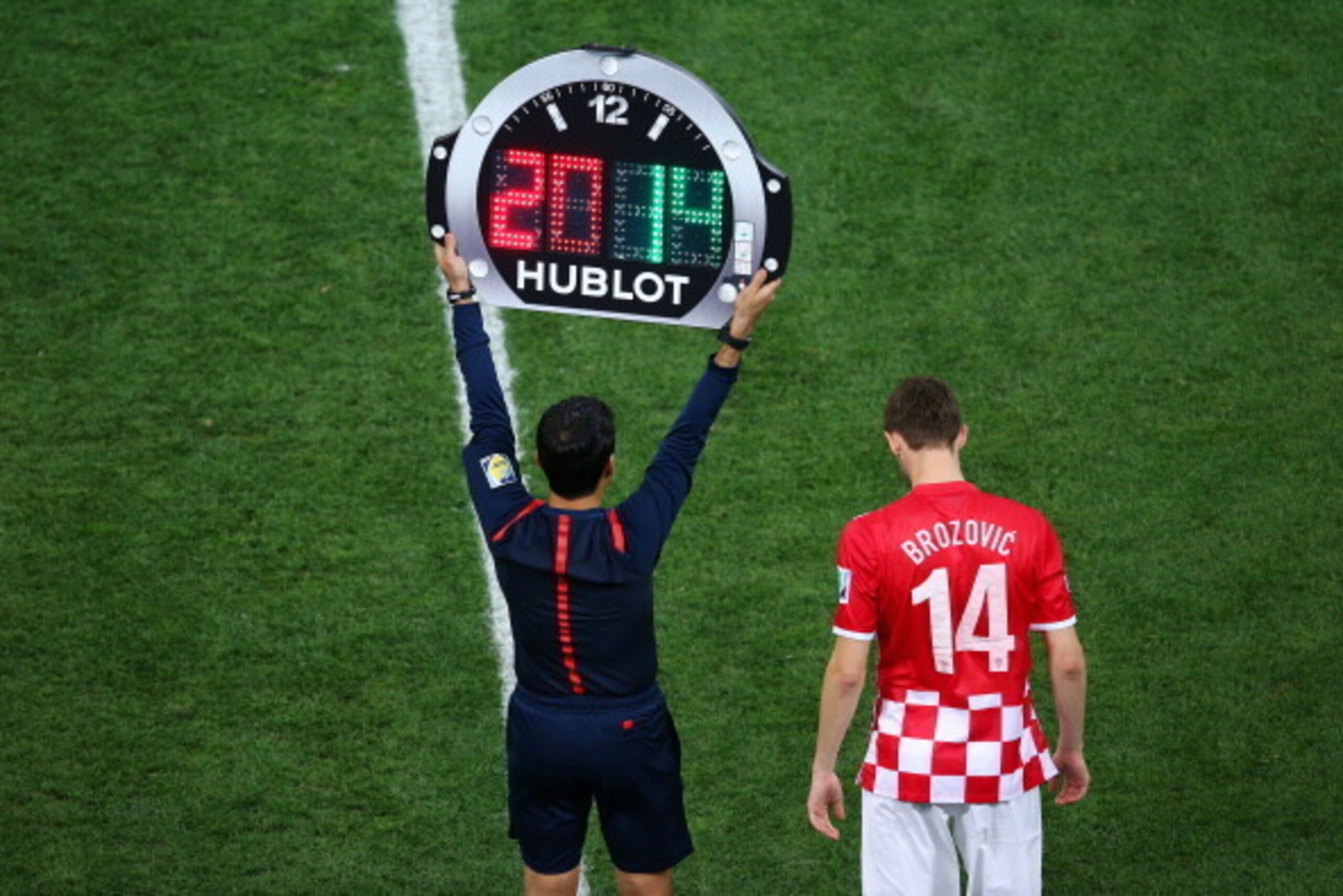 SAO PAULO, BRAZIL - JUNE 12: Marcelo Brozovic of Croatia waits to enter the match during the 2014 FIFA World Cup Brazil Group A match between Brazil and Croatia at Arena de Sao Paulo on June 12, 2014 in Sao Paulo, Brazil.  (Photo by Elsa/Getty Images)