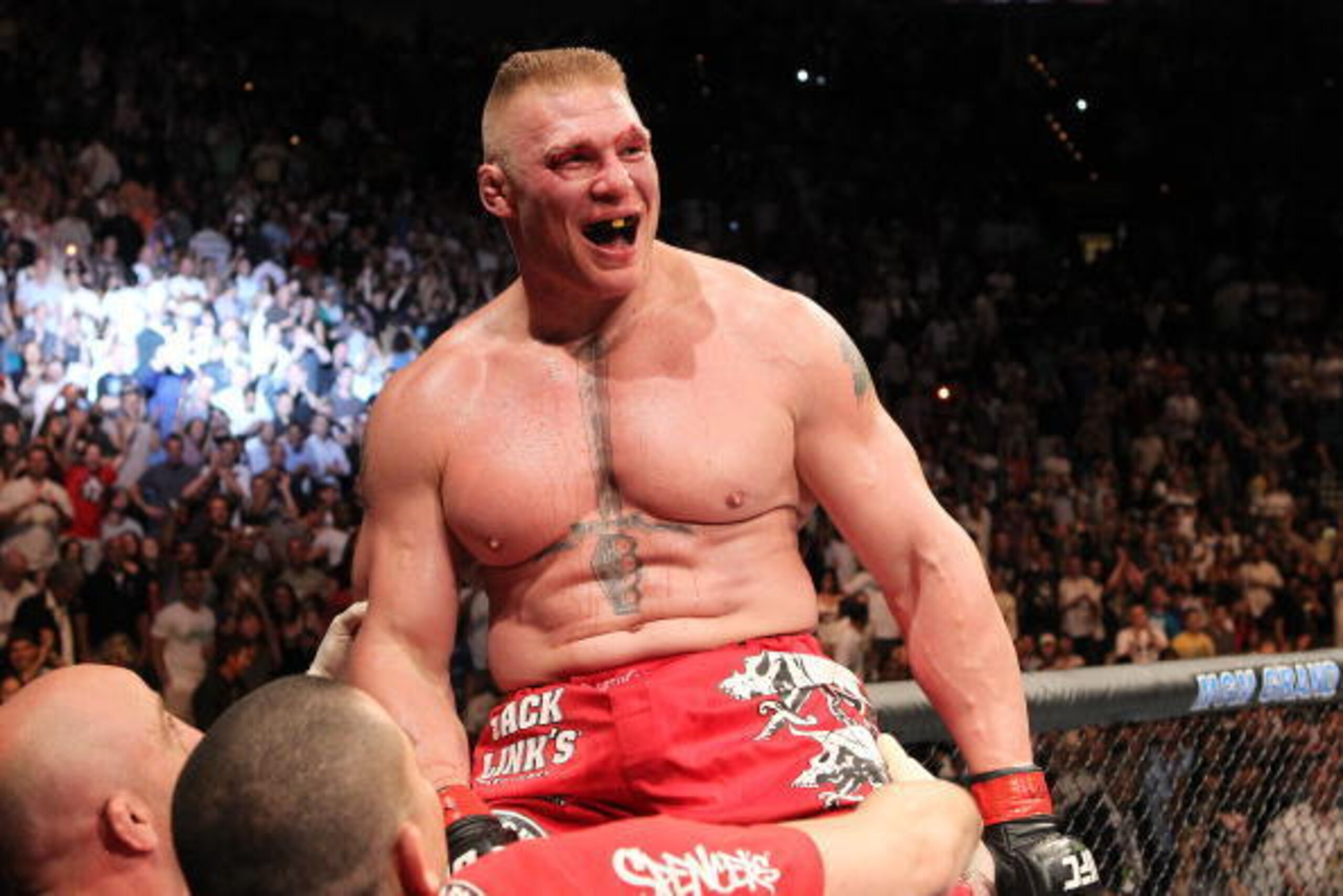 LAS VEGAS - JULY 03: Brock Lesnar reacts after his second round submission victory against Shane Carwin to win the UFC Heavyweight Championship Unification bout at the MGM Grand Garden Arena on July 3, 2010 in Las Vegas, Nevada. (Photo by Josh Hedges/Zu LAS VEGAS - JULY 03: Brock Lesnar reacts after his second round submission victory against Shane Carwin to win the UFC Heavyweight Championship Unification bout at the MGM Grand Garden Arena on July 3, 2010 in Las Vegas, Nevada. (Photo by Josh Hedges/Zu