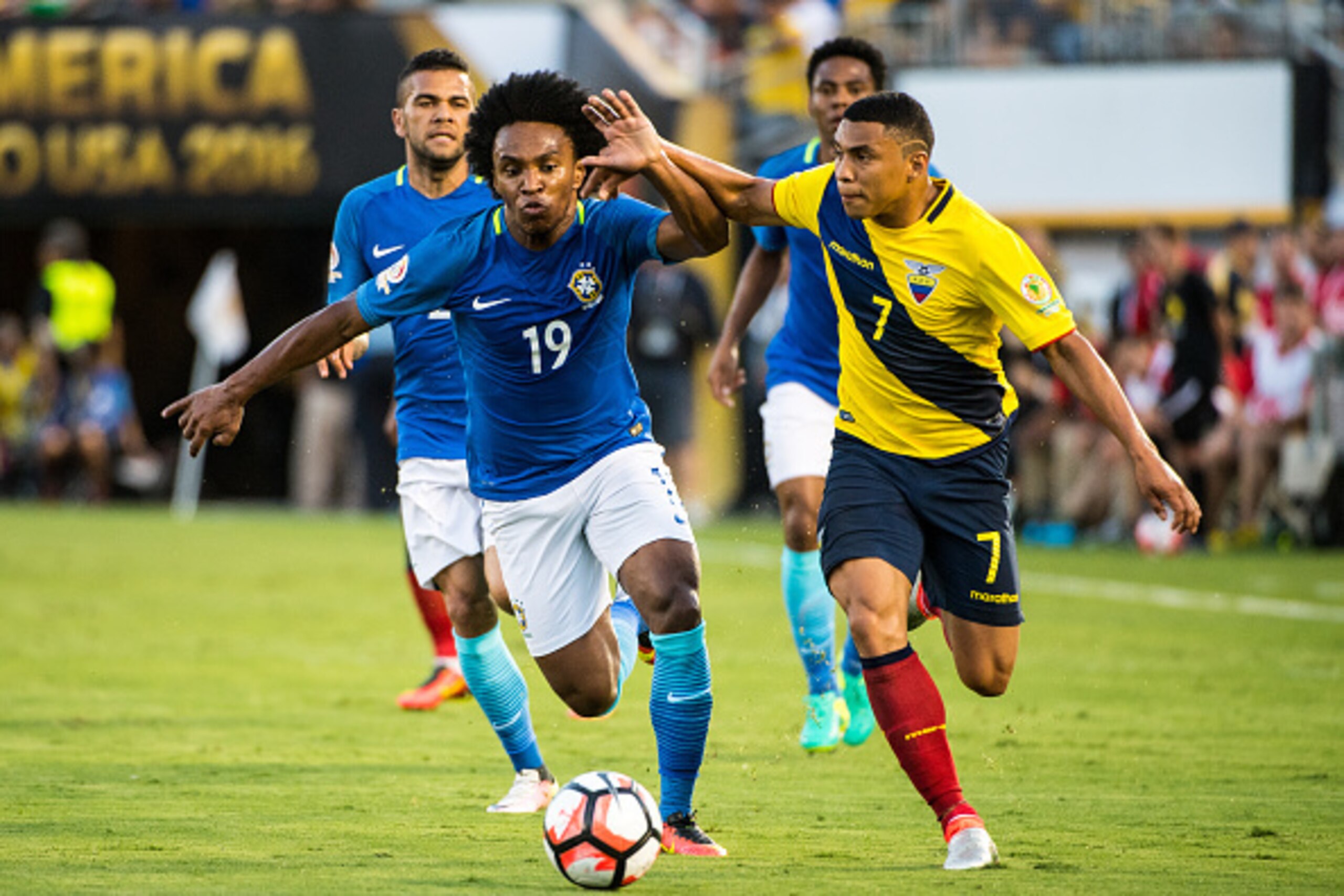 PASADENA, CA - JUNE 4: Willian #19 of Brazil attempts to keep up with Jefferson Montero #7 of Ecuador during the Copa America Centenario Group B match between Brazil and Ecuador at the Rose Bowl on June 4, 2016 in Pasadena, California. The final score was