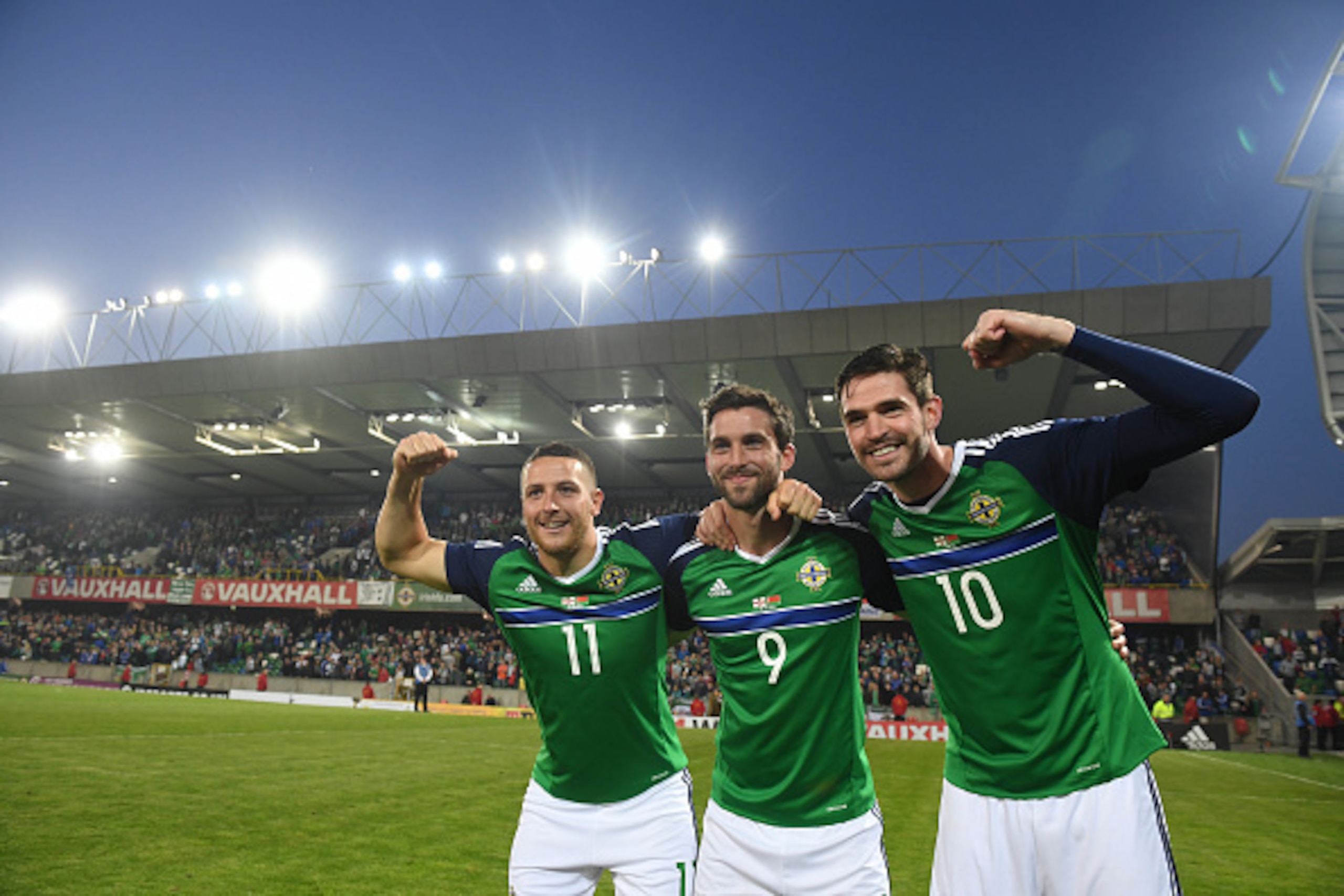 BELFAST, NORTHERN IRELAND - MAY 27: Northern Ireland's Kyle Lafferty (R), Will Grigg (C) and Conor Washington (L) after the international friendly game between Northern Ireland and Belarus on May 27, 2016 in Belfast, Northern Ireland. (Photo by Charles Mc