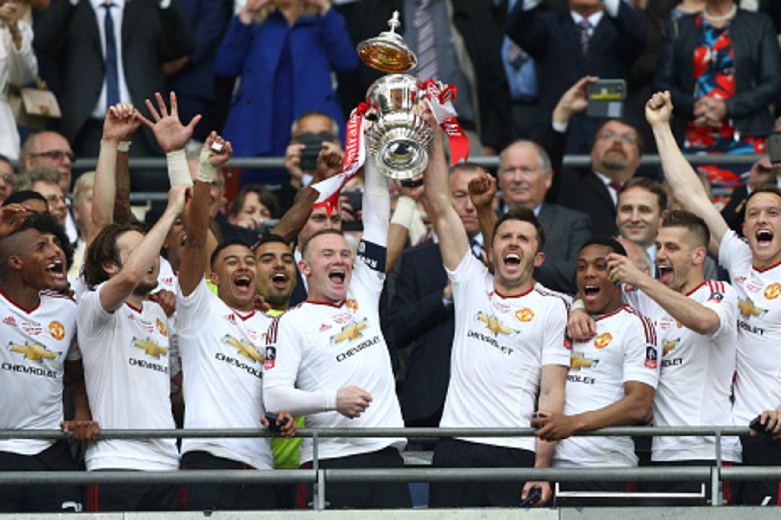 LONDON, ENGLAND - MAY 21: Wayne Rooney and Michael Carrick of Manchester United lift the trophy after winning The Emirates FA Cup Final match between Manchester United and Crystal Palace at Wembley Stadium on May 21, 2016 in London, England. (Photo by P LONDON, ENGLAND - MAY 21: Wayne Rooney and Michael Carrick of Manchester United lift the trophy after winning The Emirates FA Cup Final match between Manchester United and Crystal Palace at Wembley Stadium on May 21, 2016 in London, England. (Photo by P