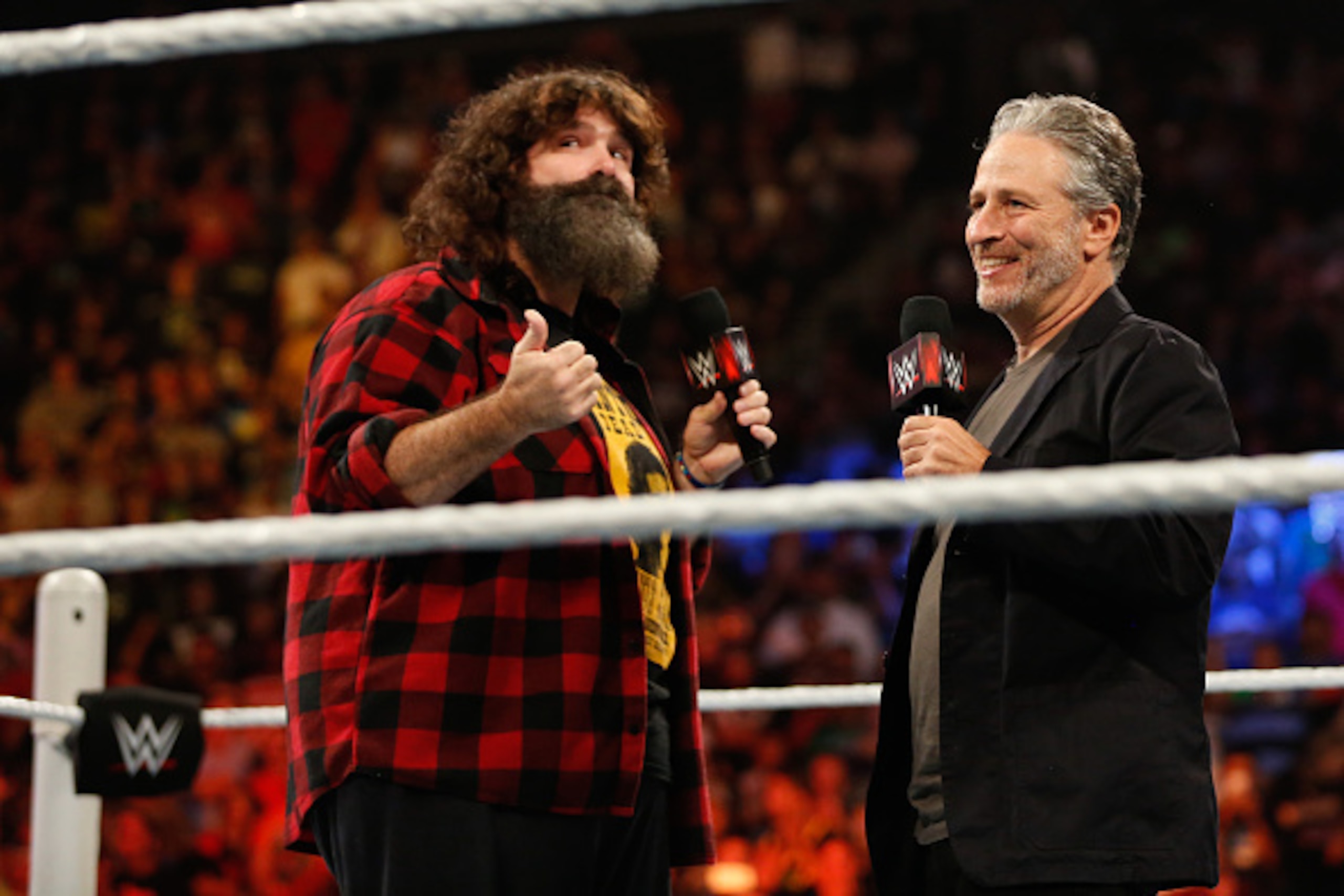 NEW YORK, NY - AUGUST 23: Mick Foley talks to WWE SummerSlam Host Jon at Barclays Center of Brooklyn on August 23, 2015 in New York City. (Photo by JP Yim/Getty Images) NEW YORK, NY - AUGUST 23: Mick Foley talks to WWE SummerSlam Host Jon at Barclays Center of Brooklyn on August 23, 2015 in New York City. (Photo by JP Yim/Getty Images)